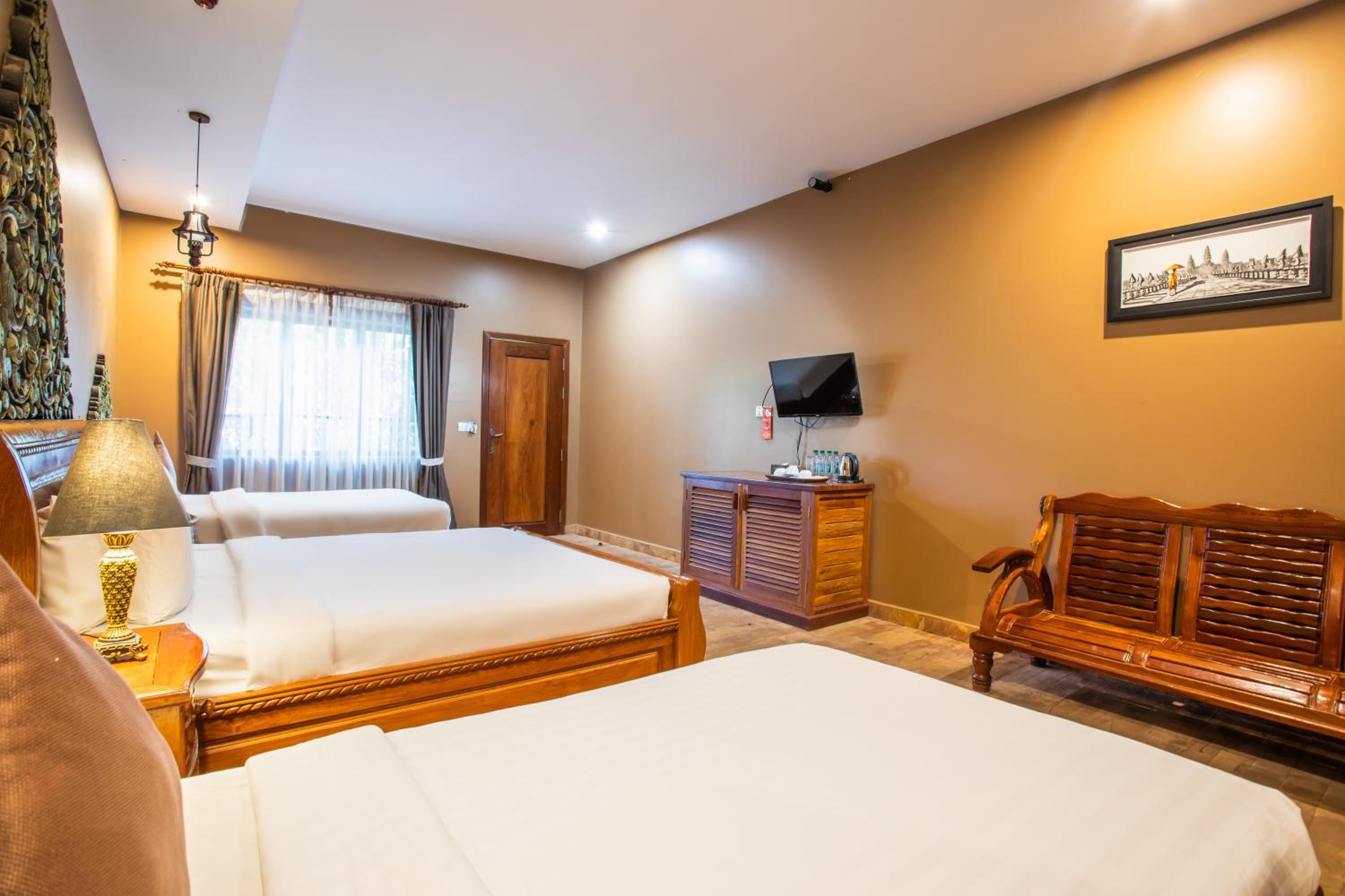 Deluxe Triple Room - Photo 10