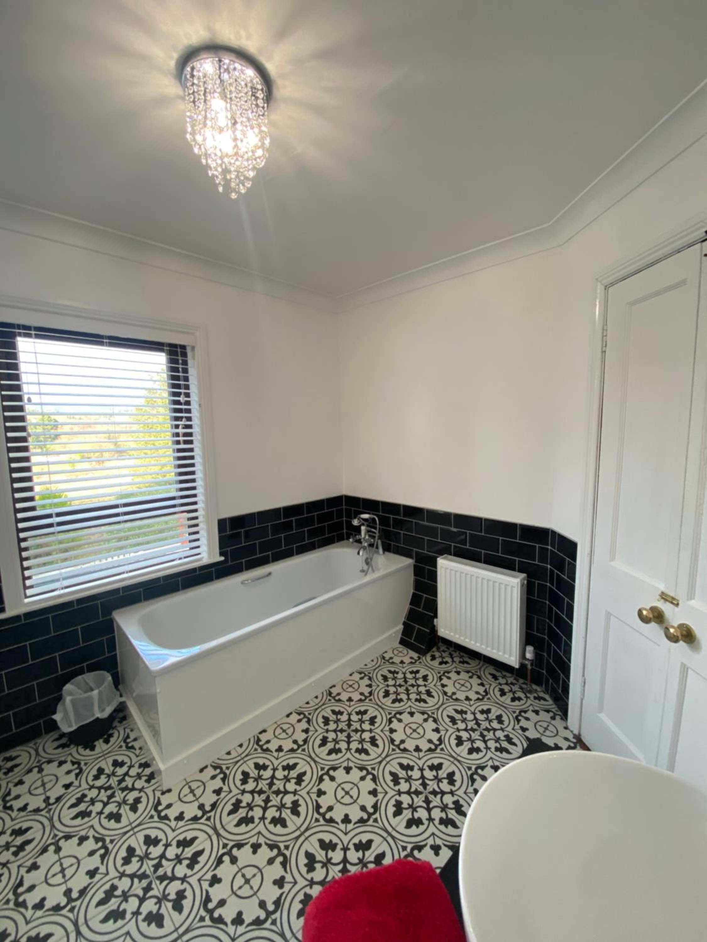 Three-Bedroom House - Photo 17