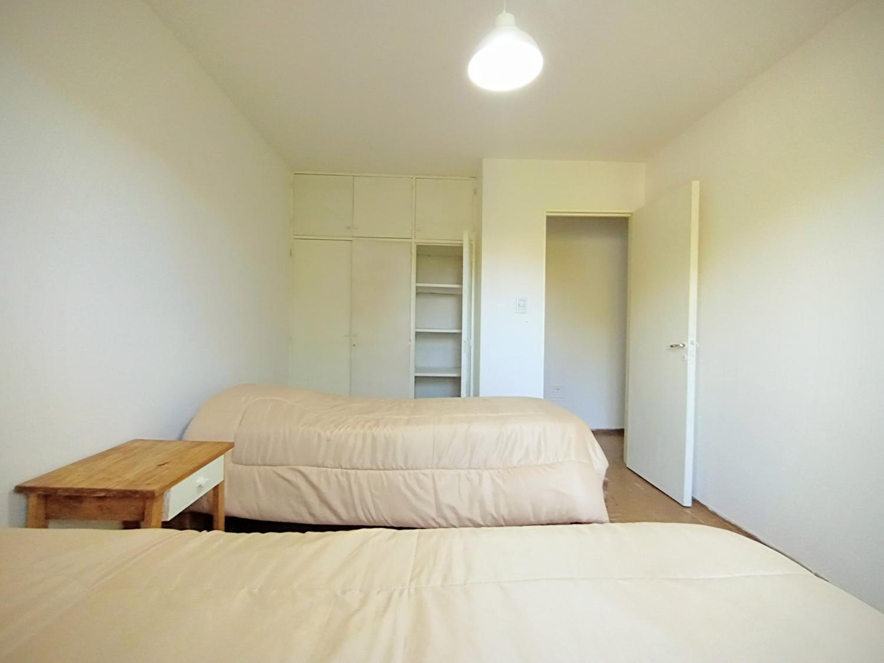 Single Bed in Dormitory Room