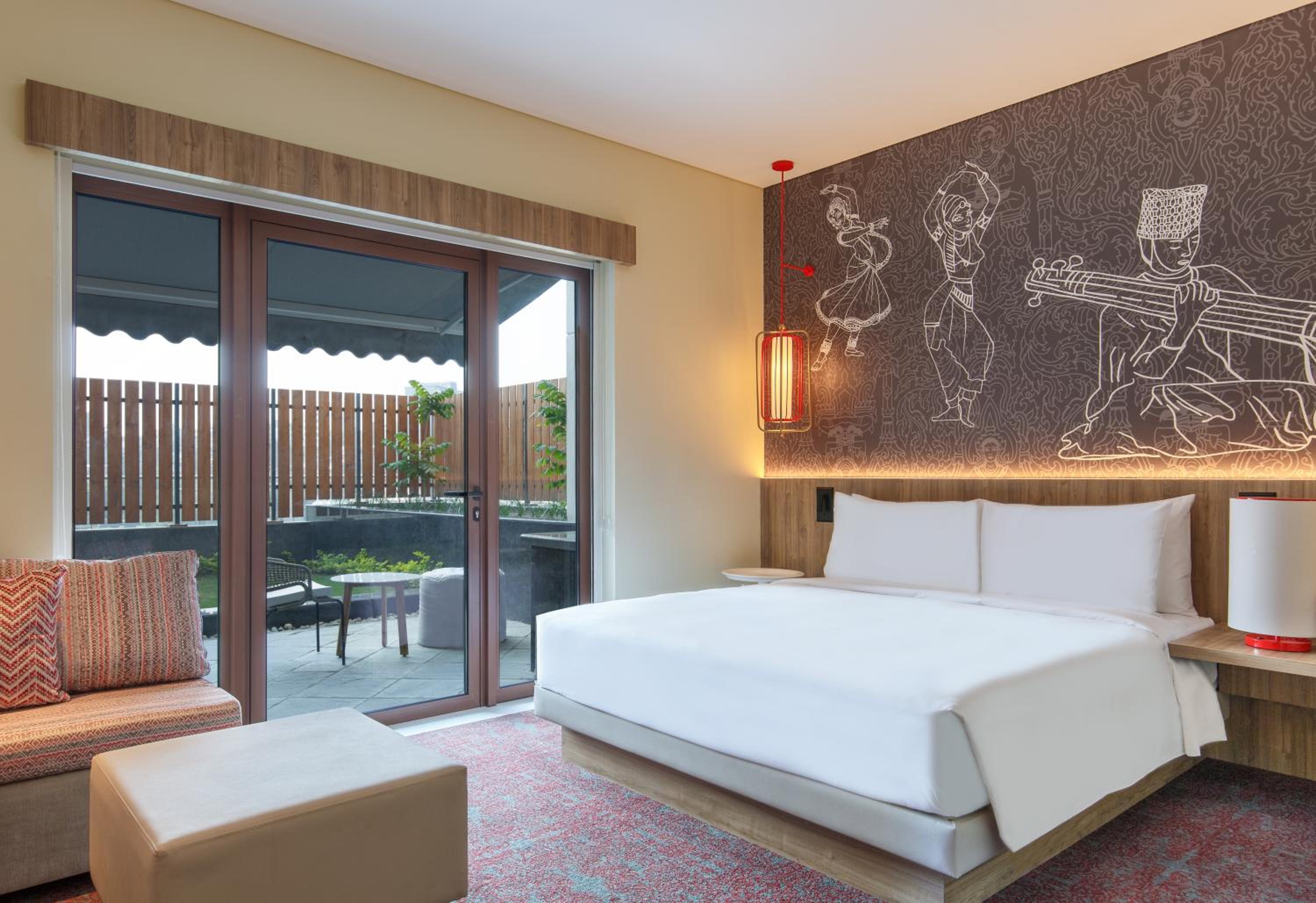 King Room with Sit out Terrace, One-way Airport Transfers, 15% disc on Food, Soft Beverages & Laundry
