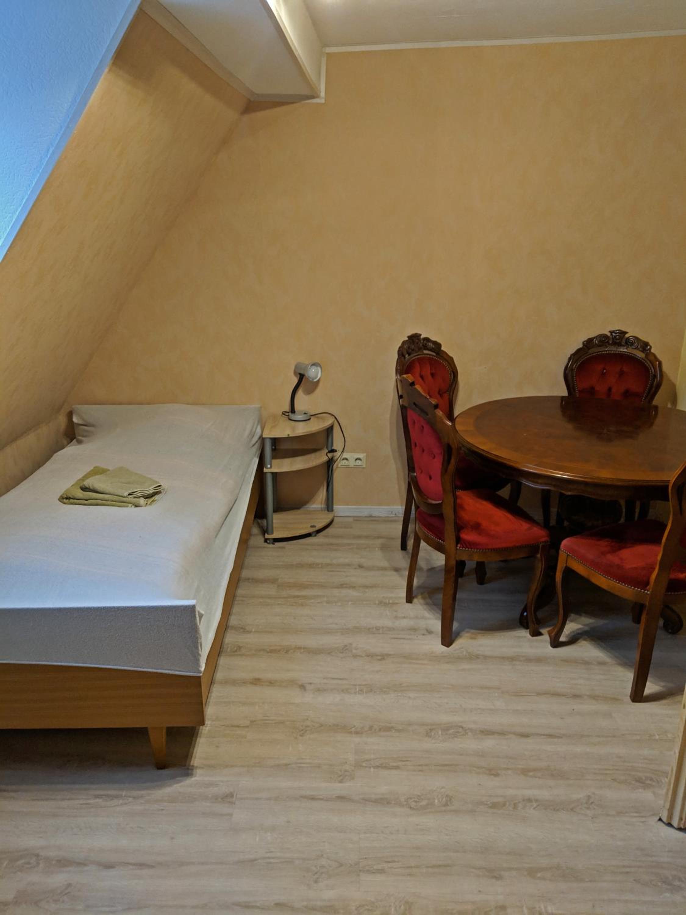Basic Triple Room With Shared Bathroom photo 1