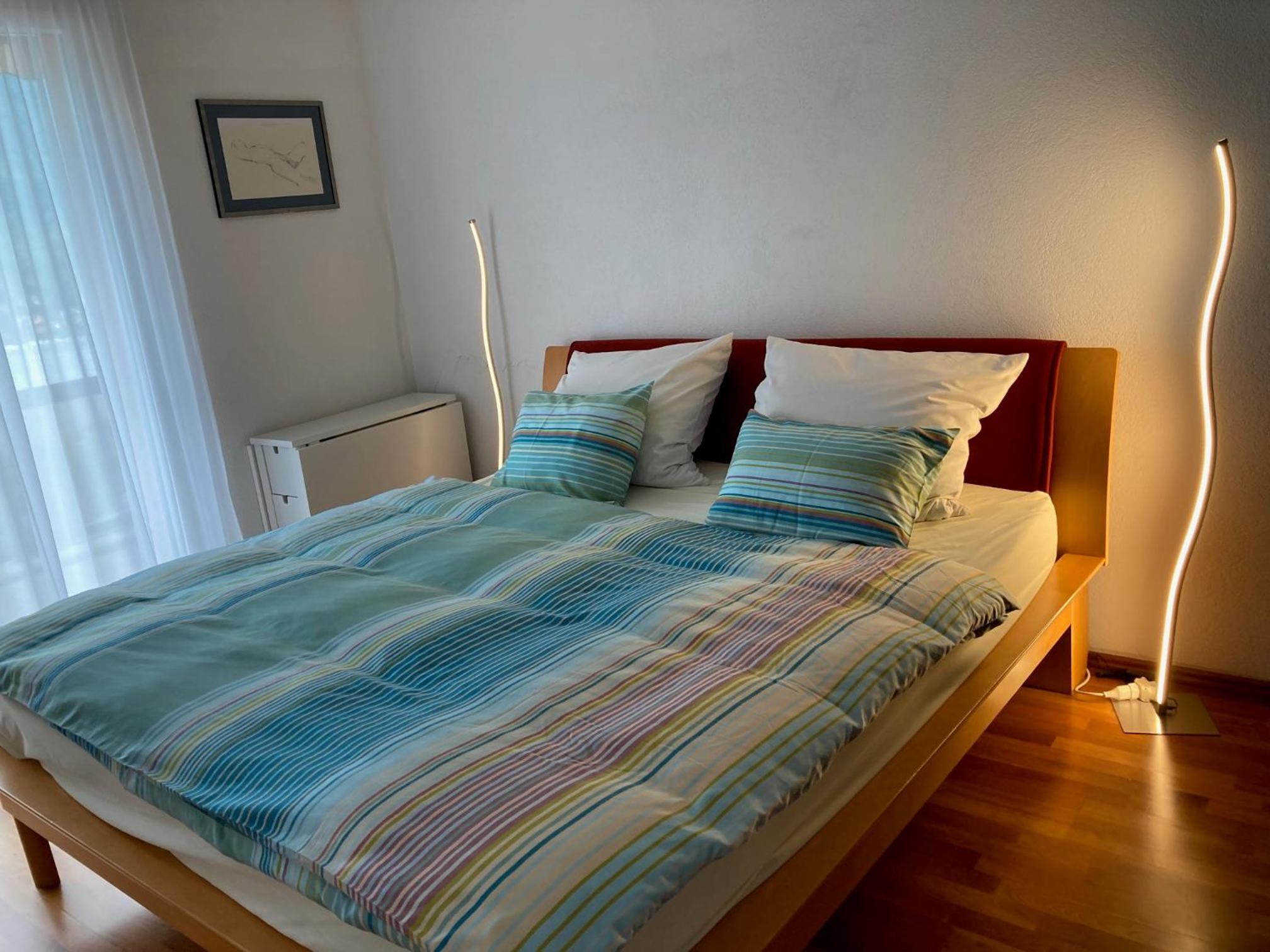 Two-Bedroom Apartment with Balcony and Lake View photo 1