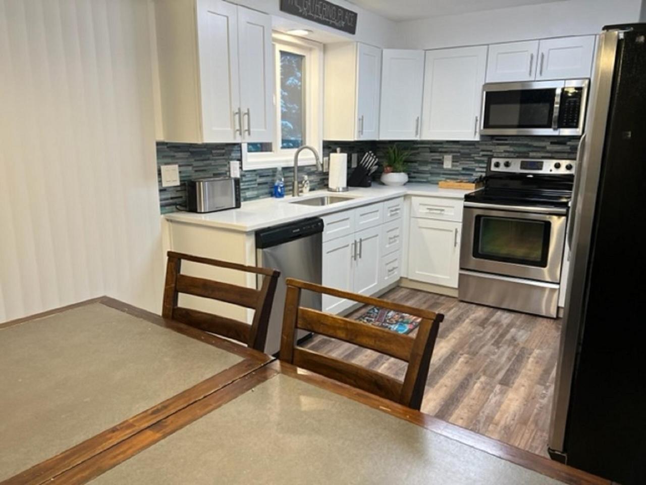 Four-Bedroom House - Photo 39