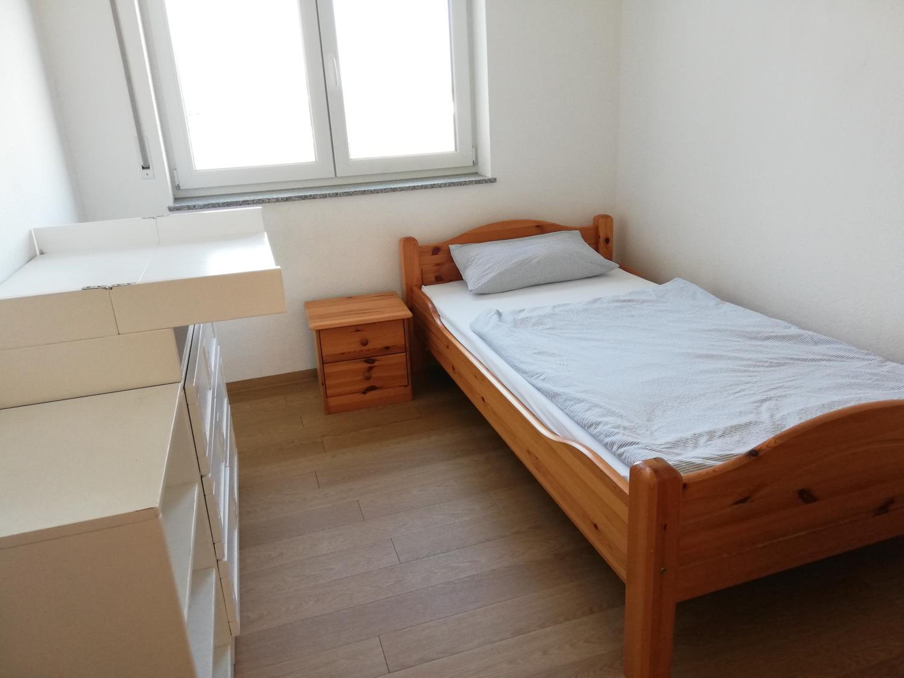 Three-Bedroom Apartment photo 1