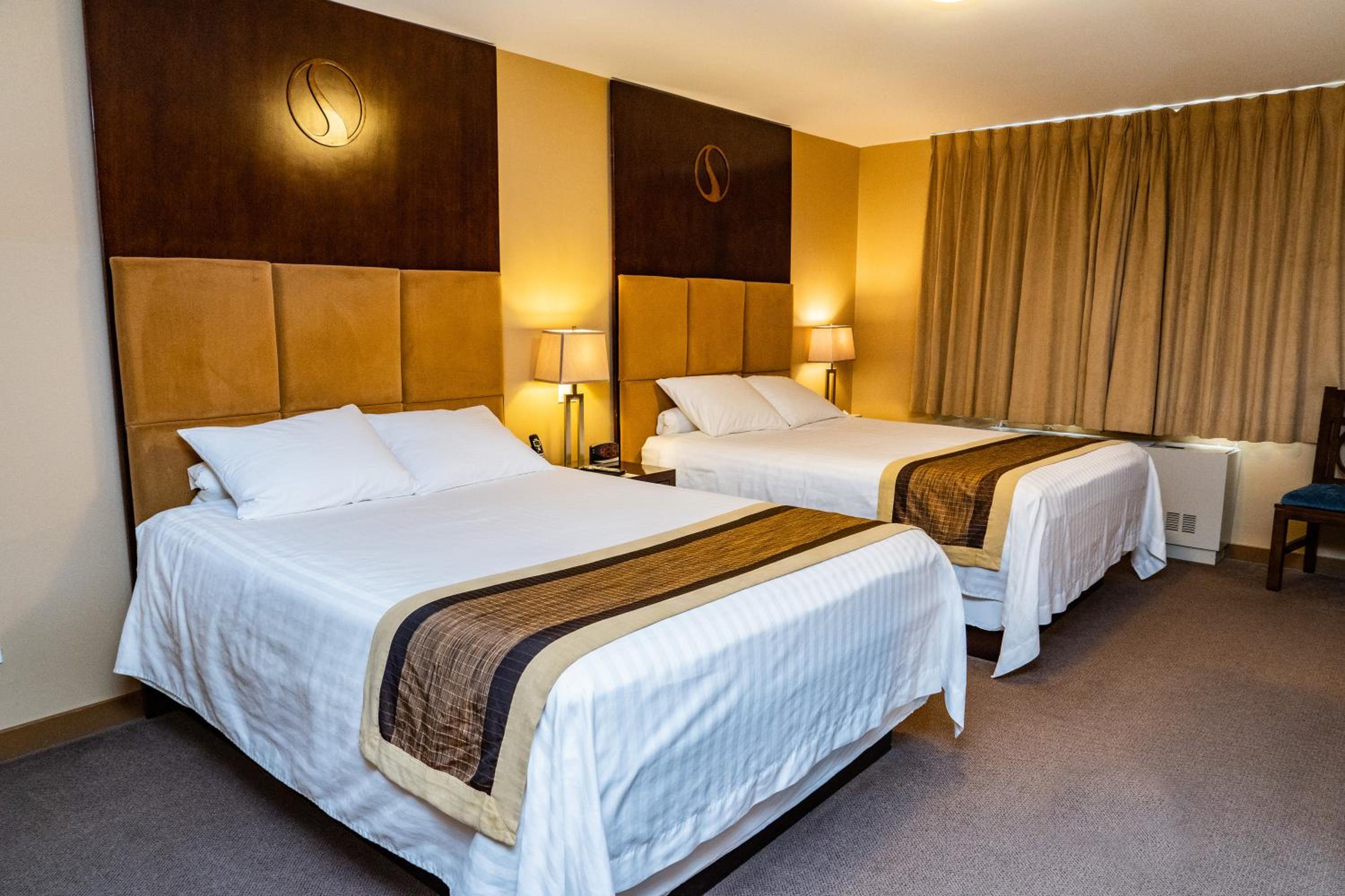 Queen Room with Two Queen Beds - Photo 1
