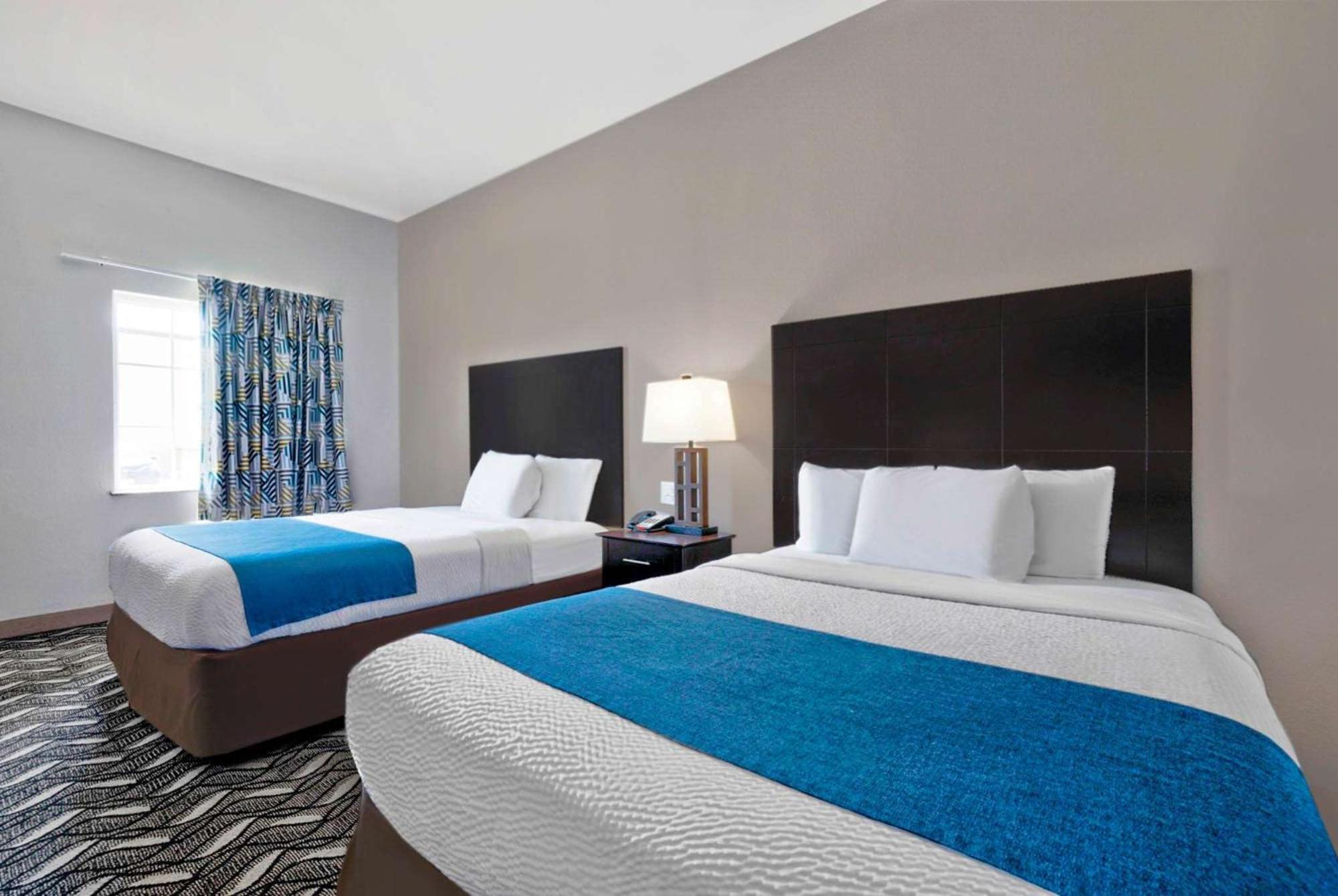 Deluxe Queen Room with Two Queen Beds - Non-Smoking photo 1
