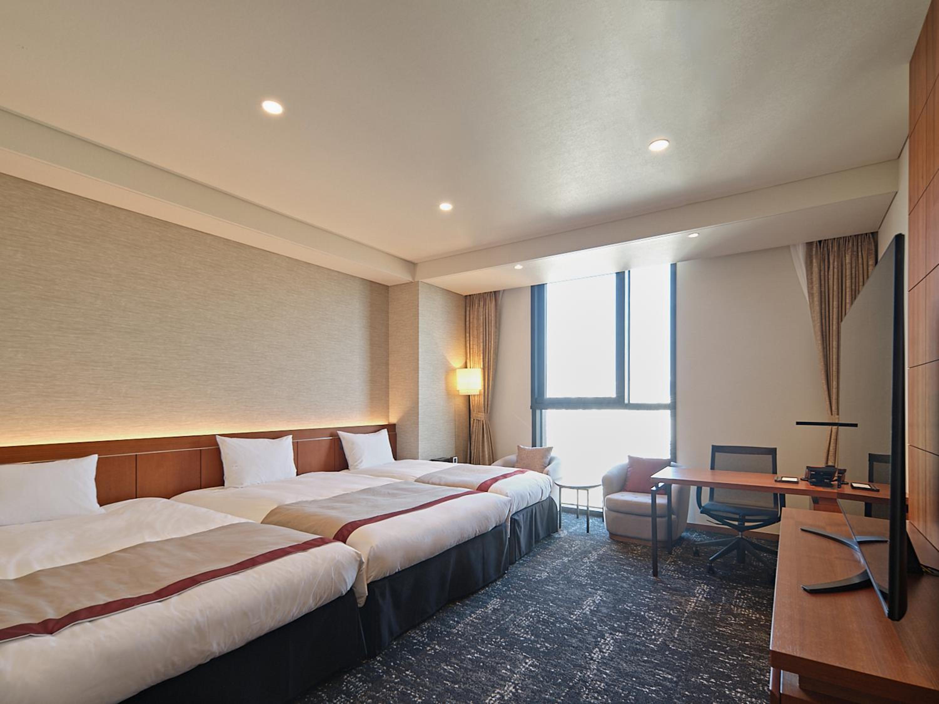 Deluxe Triple Room - Photo 1