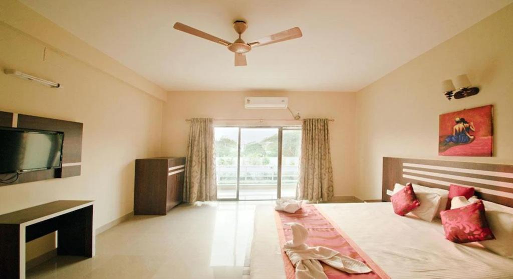 Deluxe Room - Photo 1