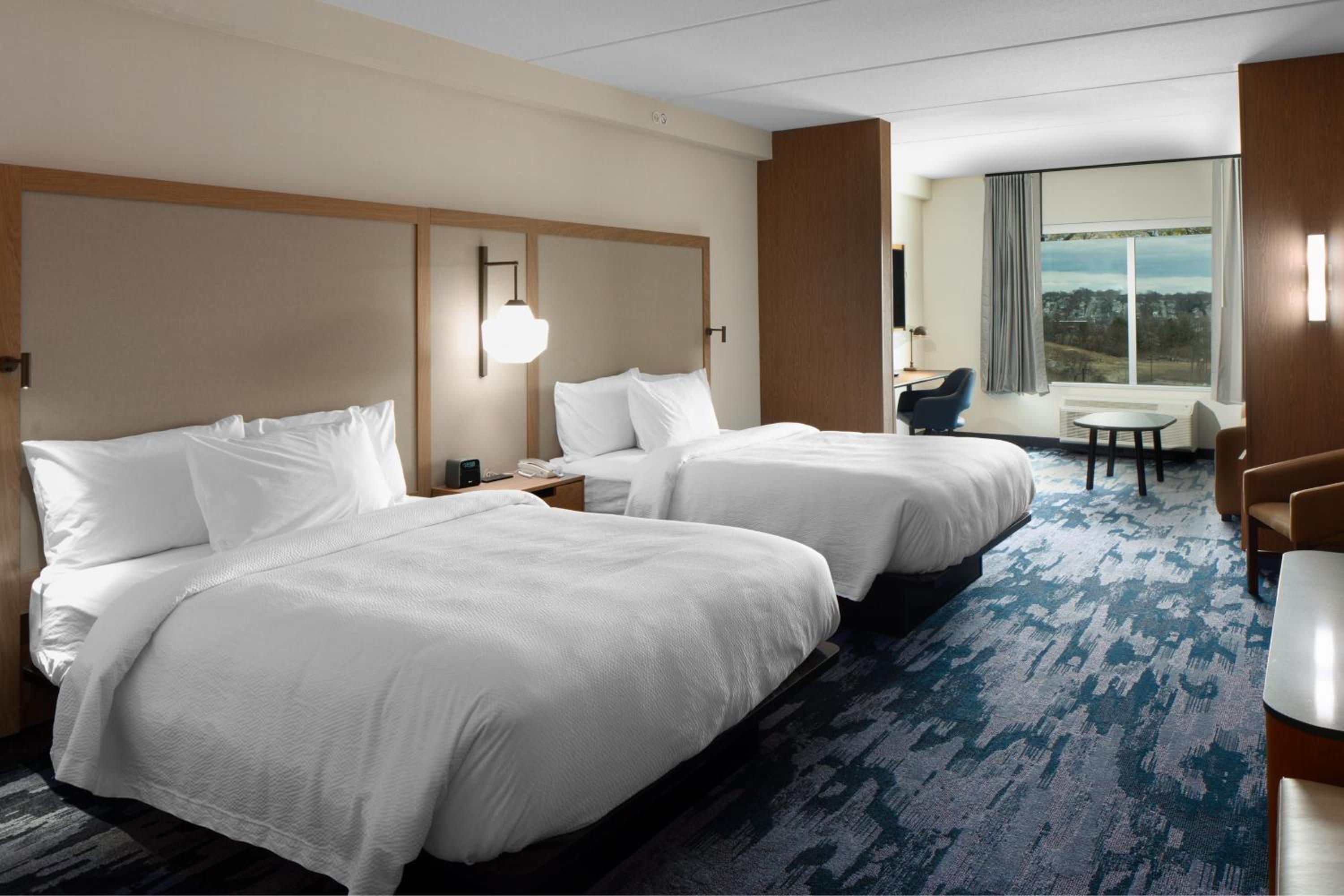 Queen Suite with Two Queen Beds and Sofa Bed - Photo 2