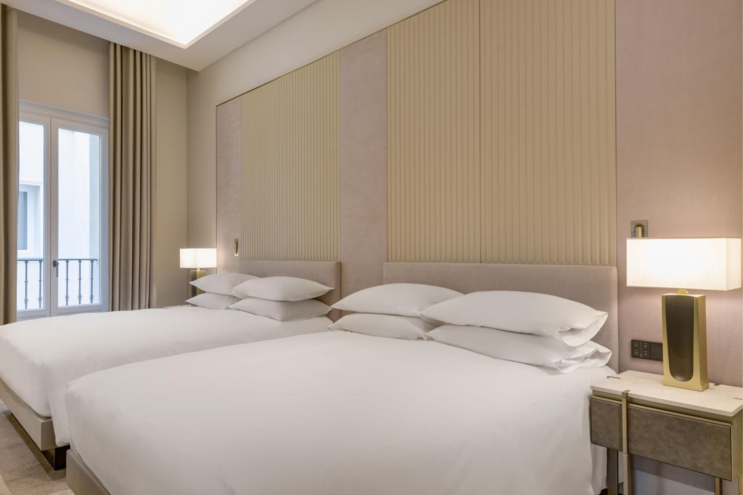 Deluxe Queen Room with Two Queen Beds and Courtyard View