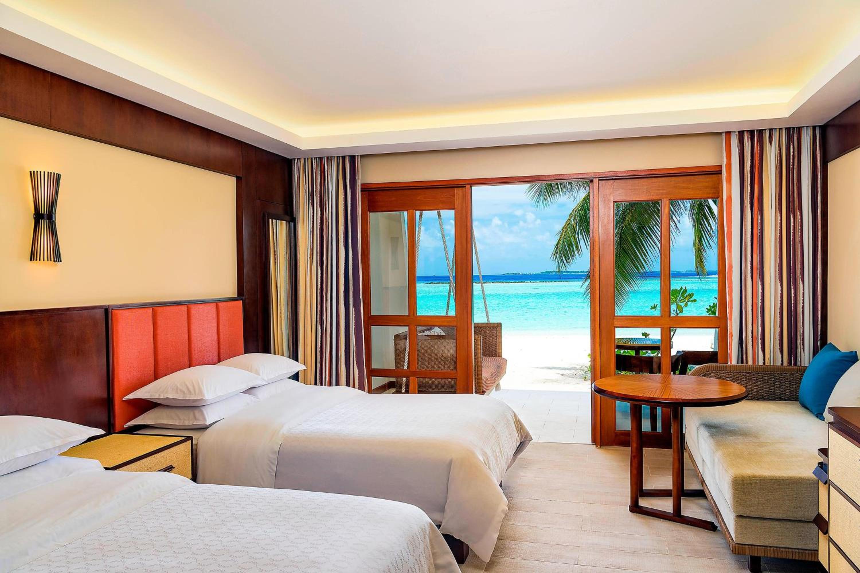 Deluxe Double Room with Two Double Beds and Beach View