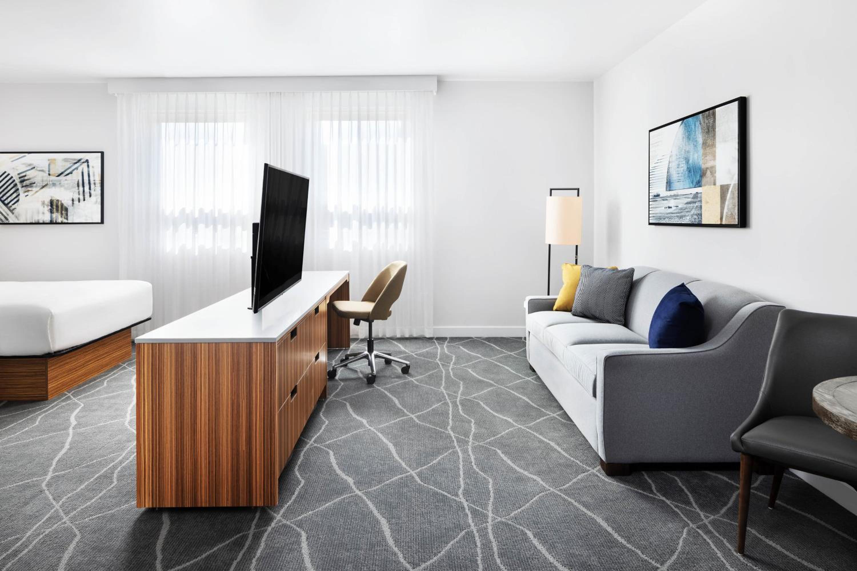 Deluxe Room with Two Queen Beds and Sofa Bed
