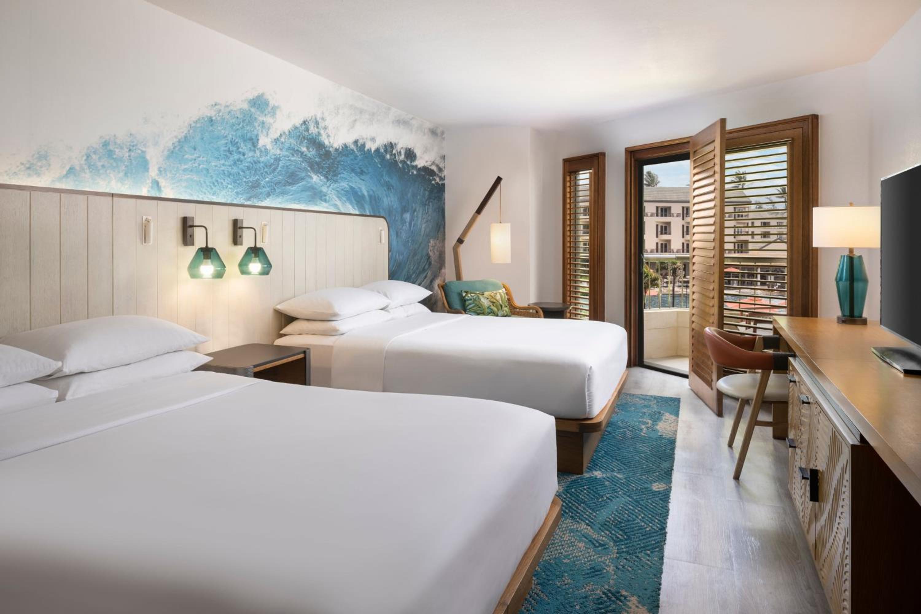 Queen Room With Two Queen Beds And Pool View 