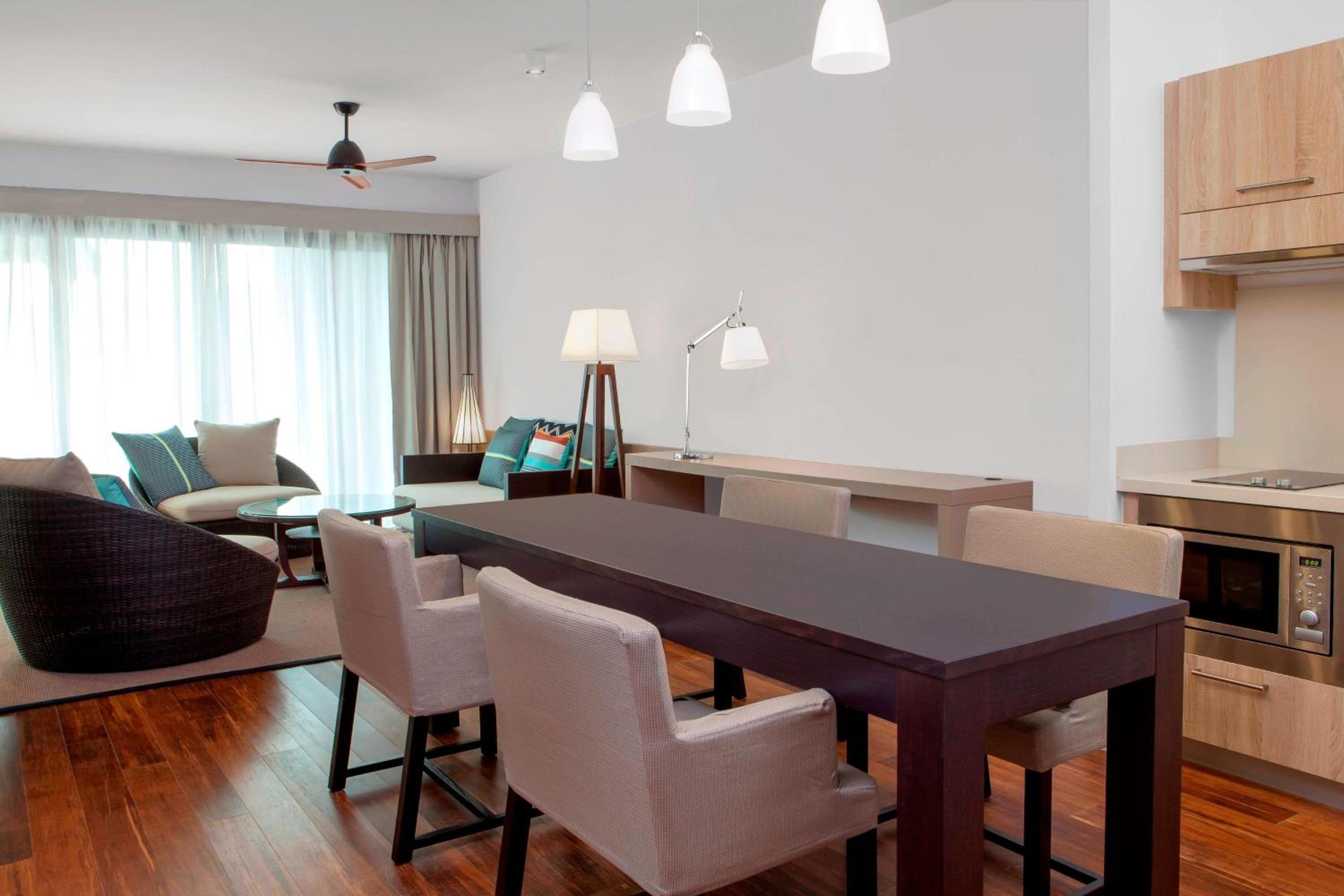 1 Bedroom Suite, 1 King, Sofa Bed, Garden View, Balcony