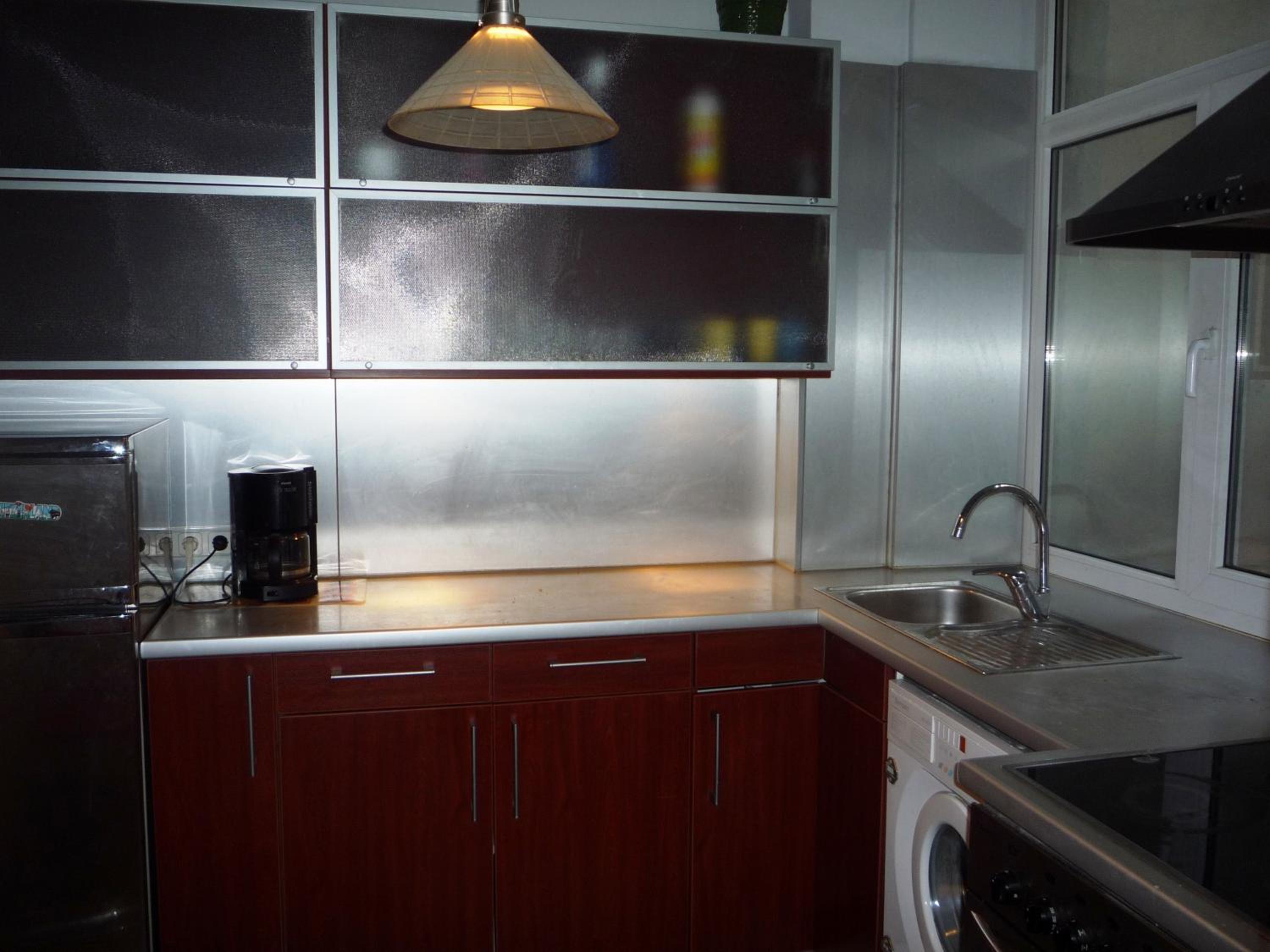 Three-Bedroom Apartment - Photo 12