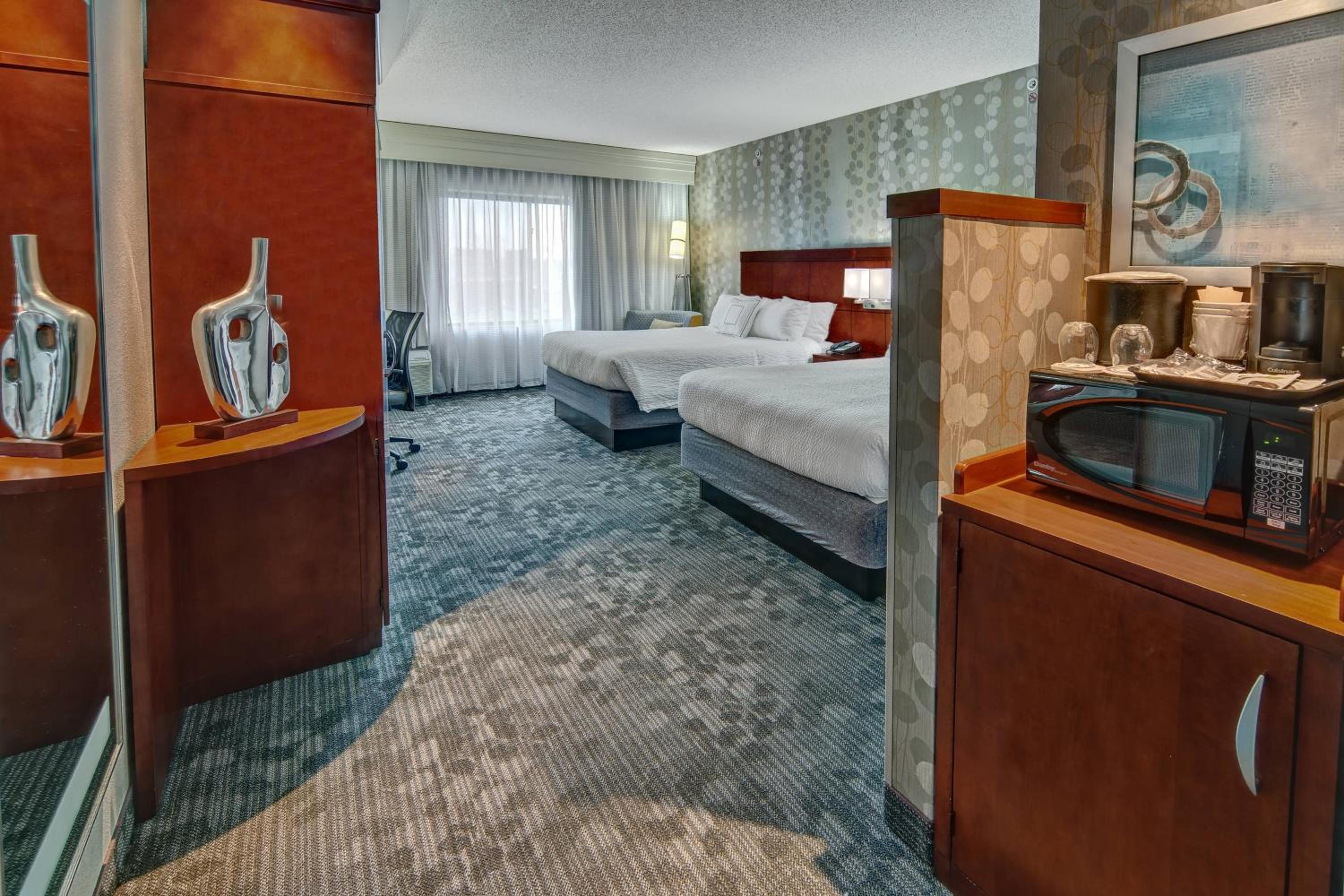 Queen Room with Two Queen Beds - Photo 1