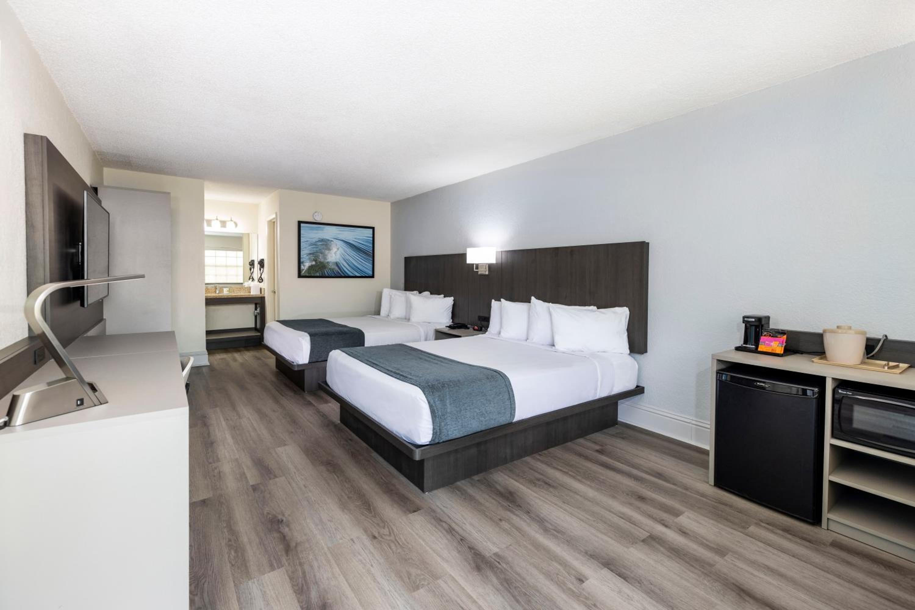 Deluxe Queen Room with Two Queen Beds - Photo 1