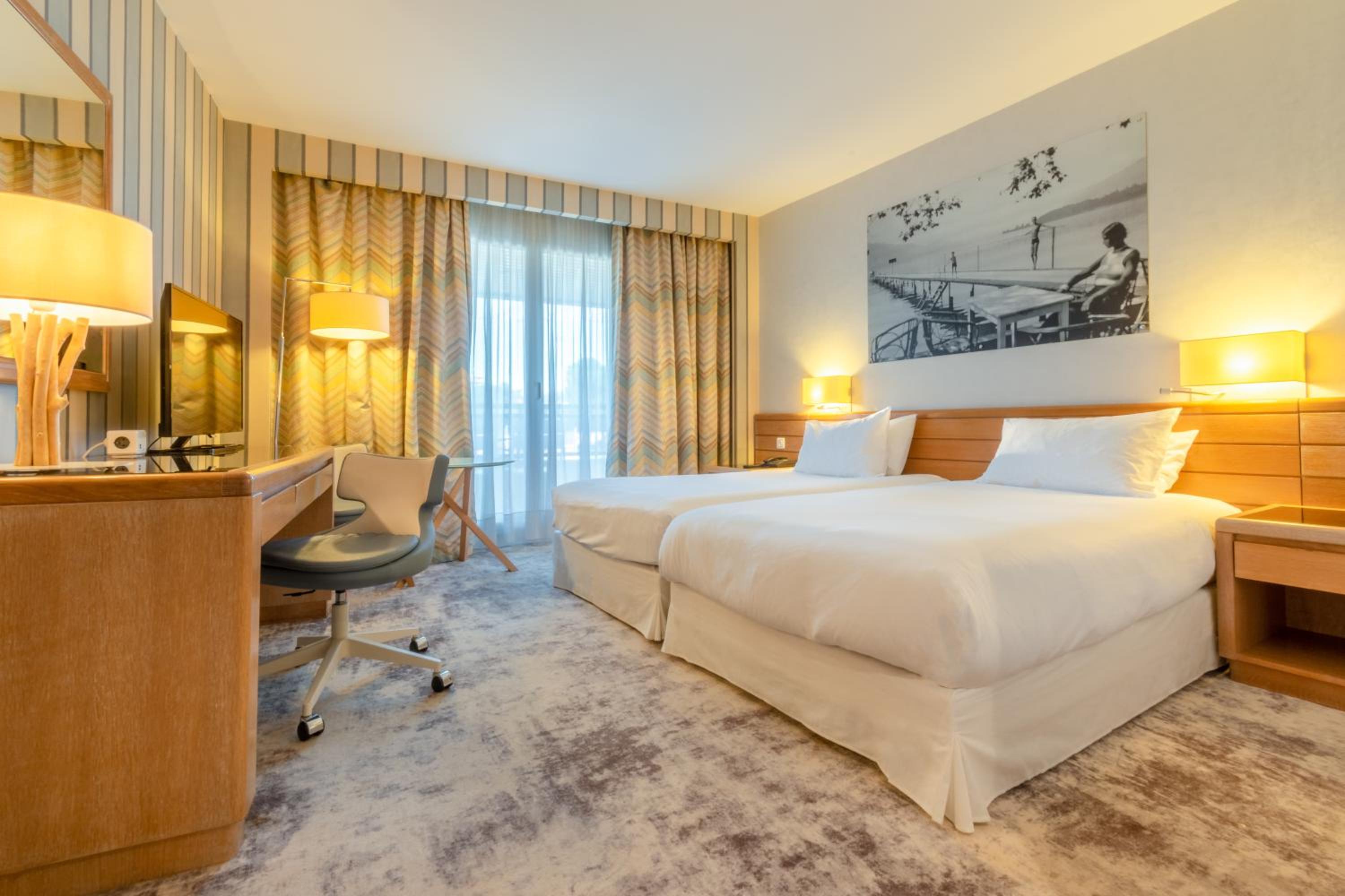 Premium Twin Room with Balcony and Garden View - Photo 1