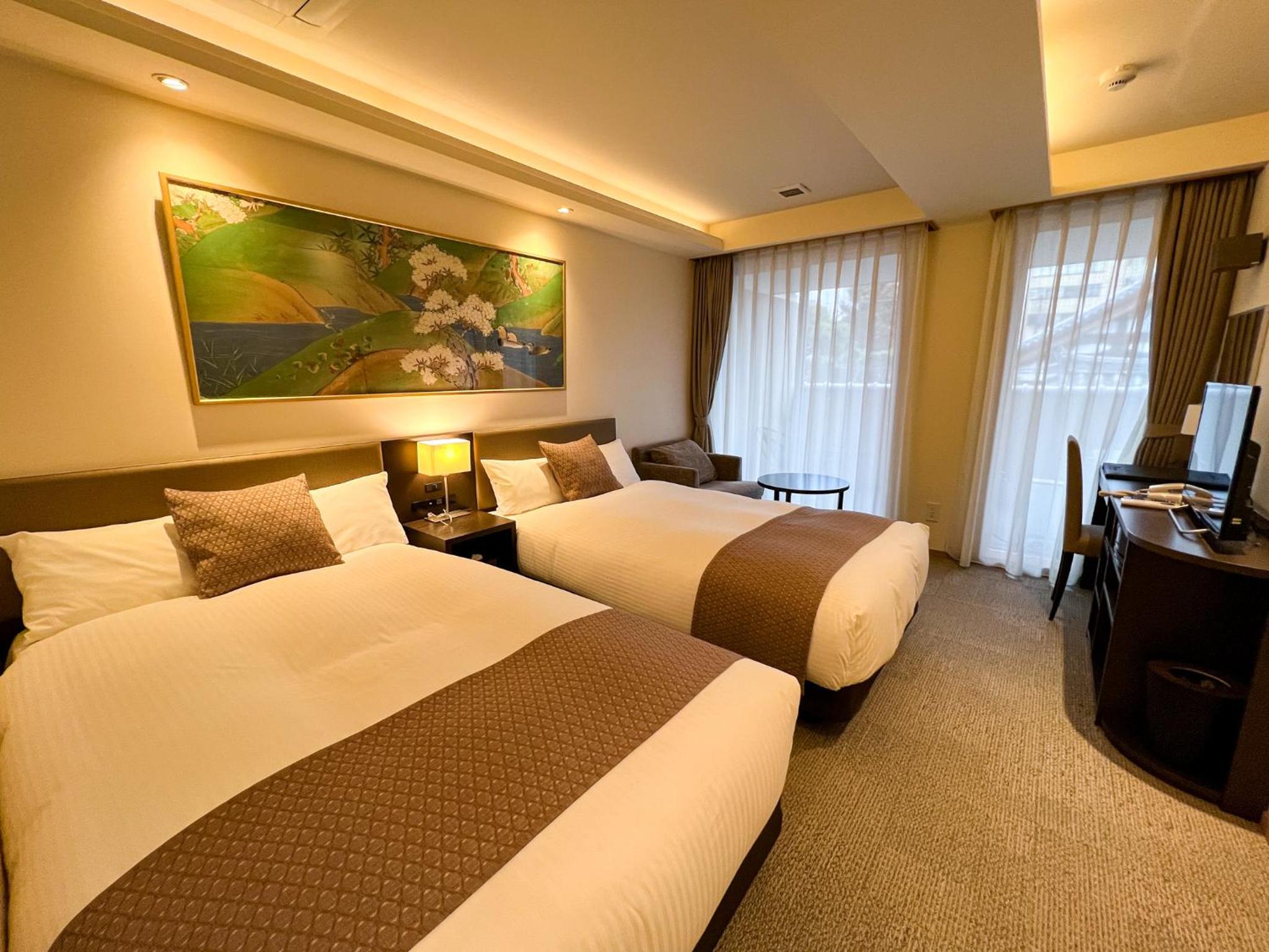 Deluxe Twin Room - Photo 10