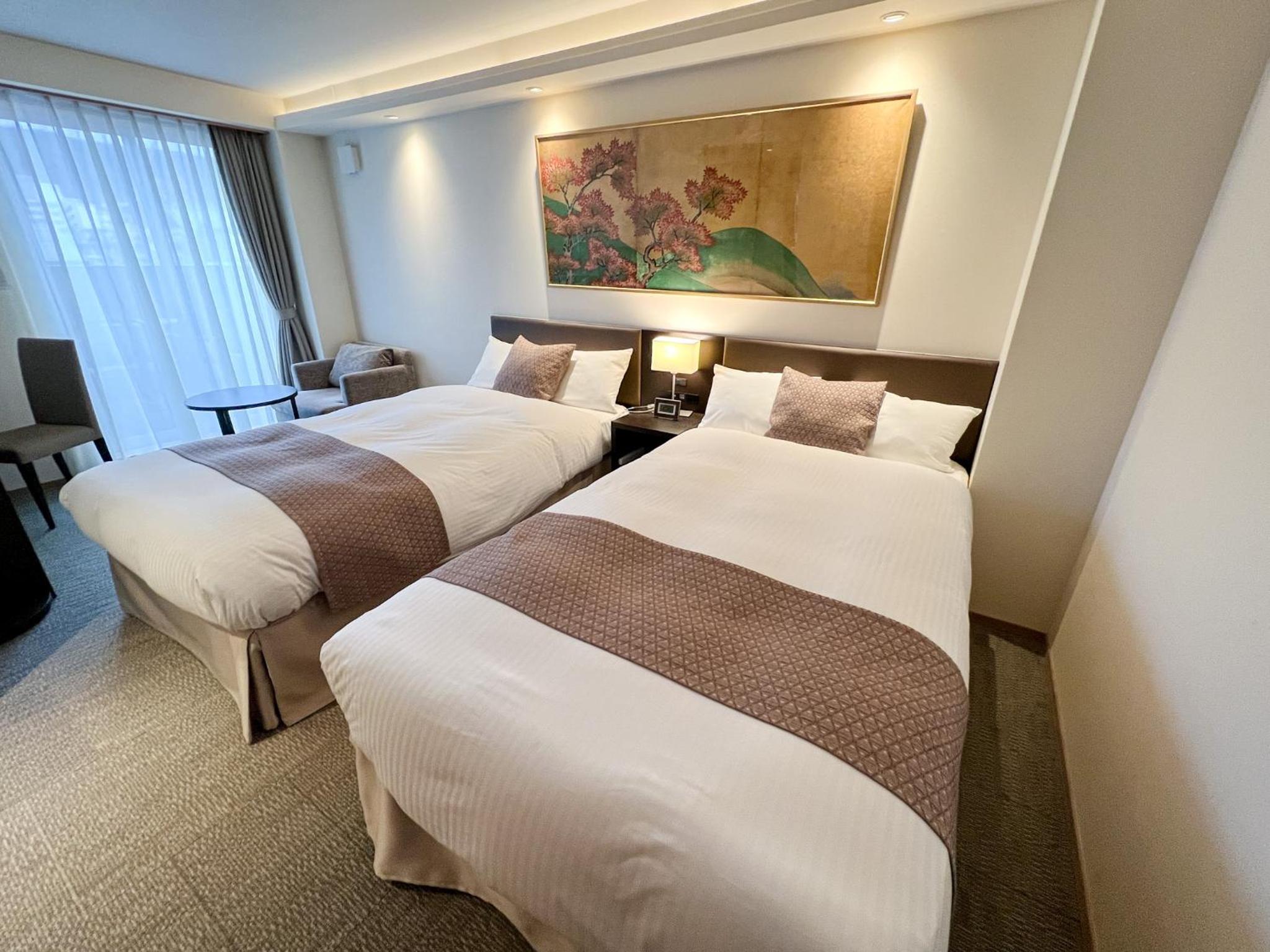 Standard Twin Room - Photo 4