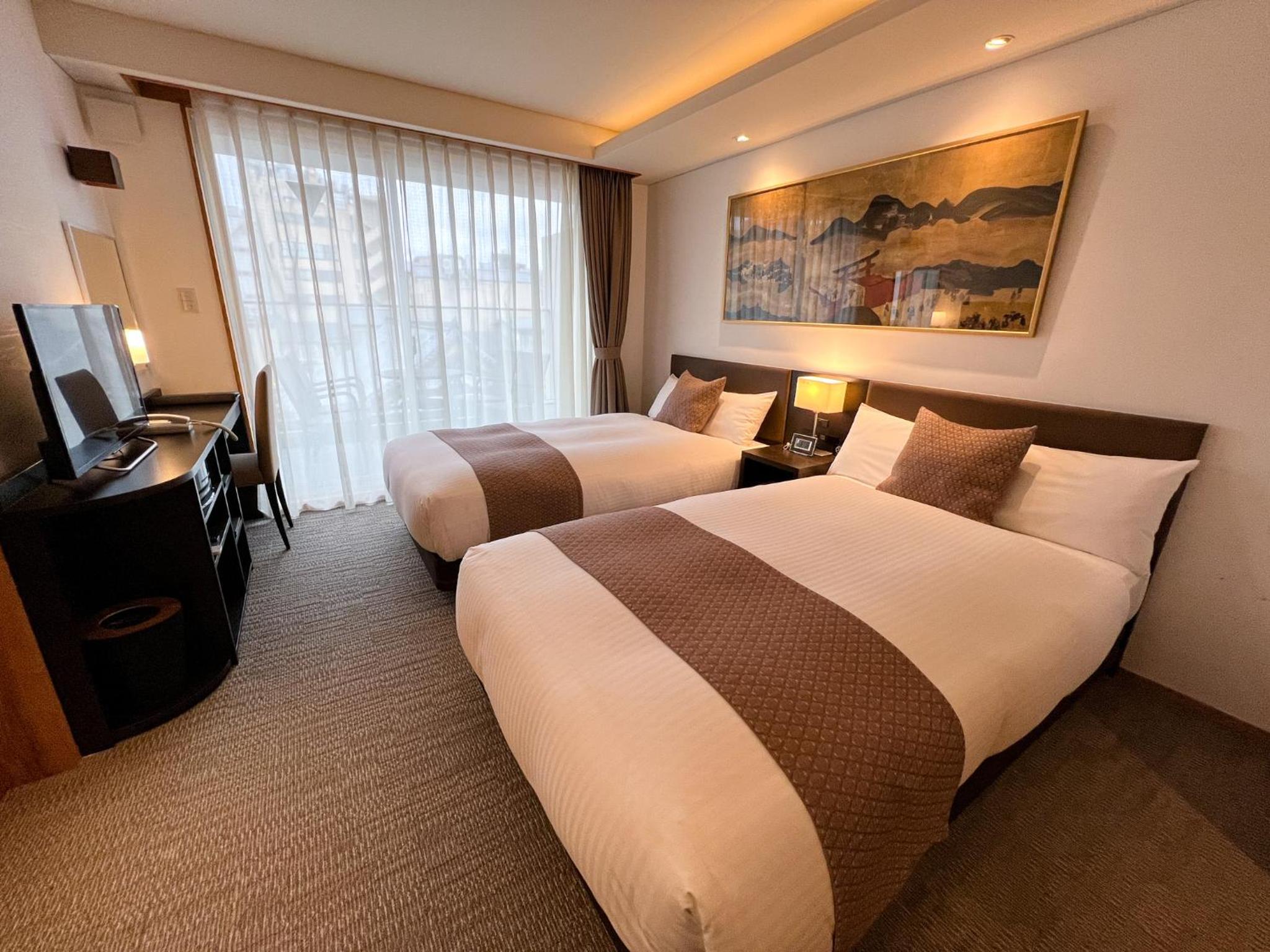 Premium Quadruple Room - Photo 23