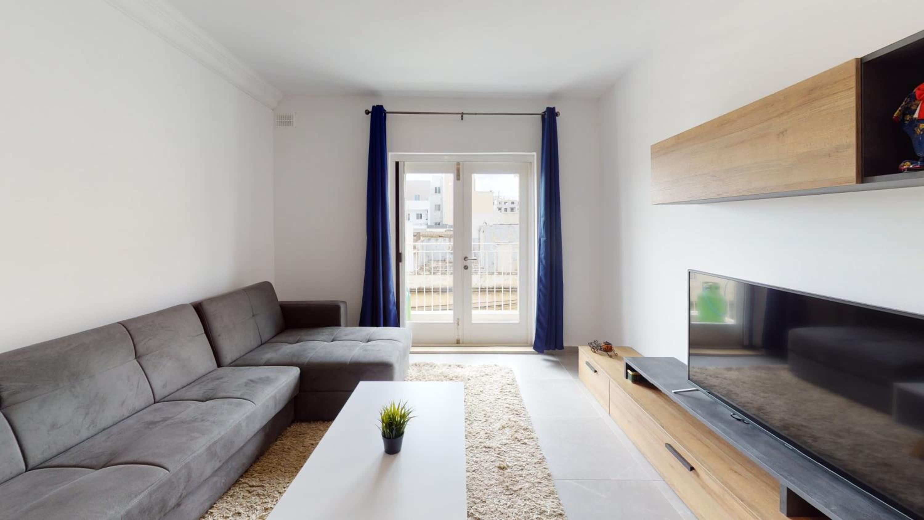 Three-Bedroom Apartment photo 1