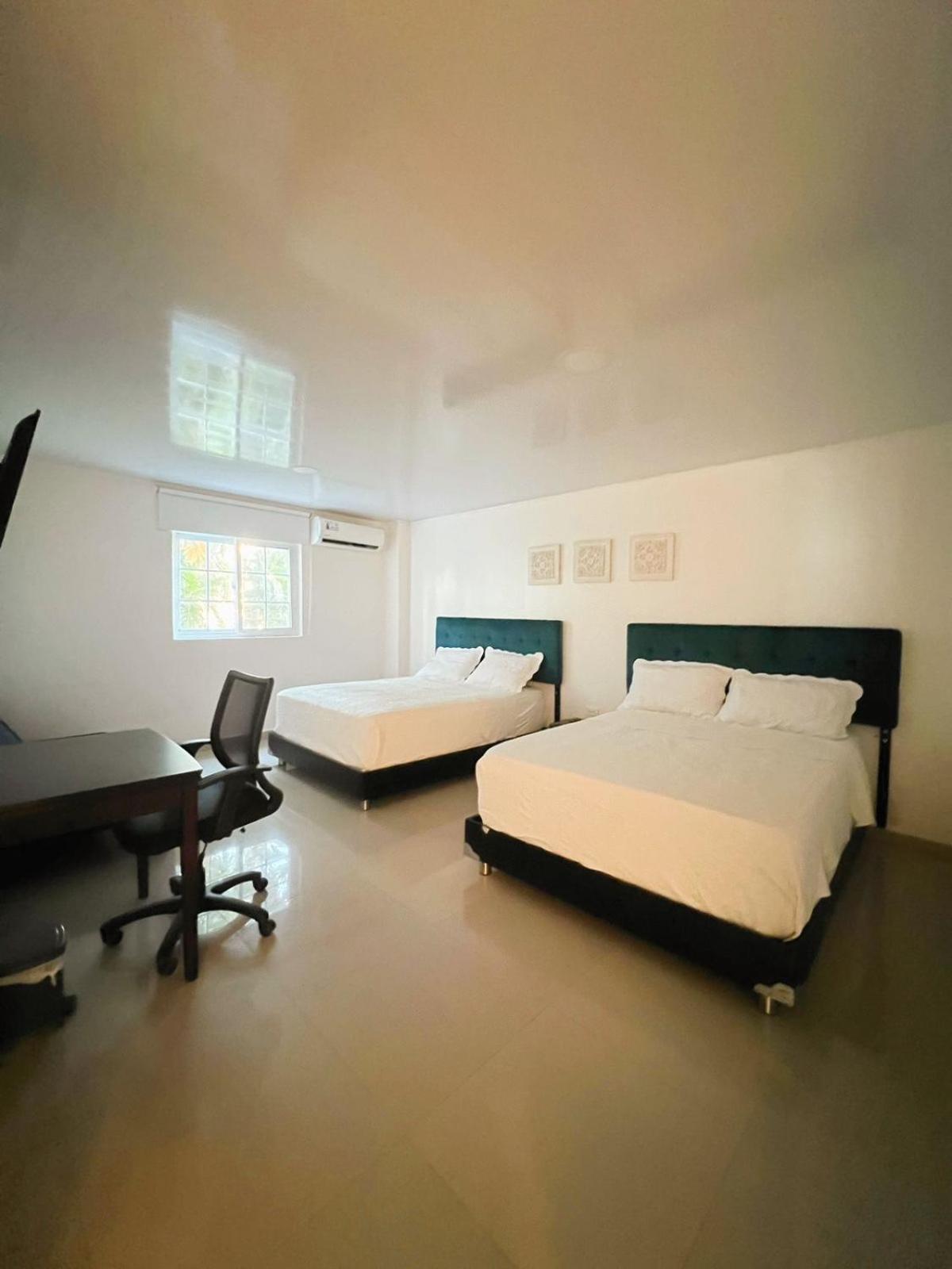 Quadruple Room with Private Bathroom