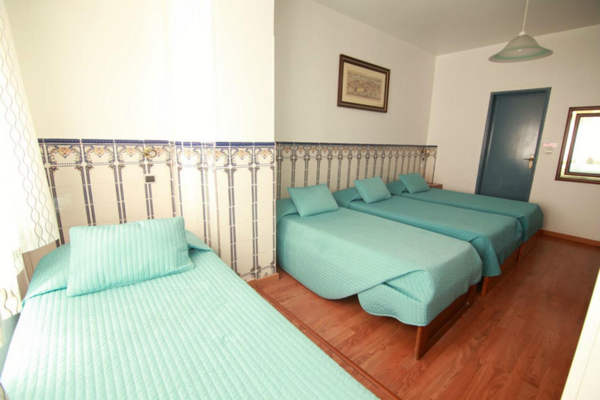 Double or Twin Room with Two Extra Beds photo 1