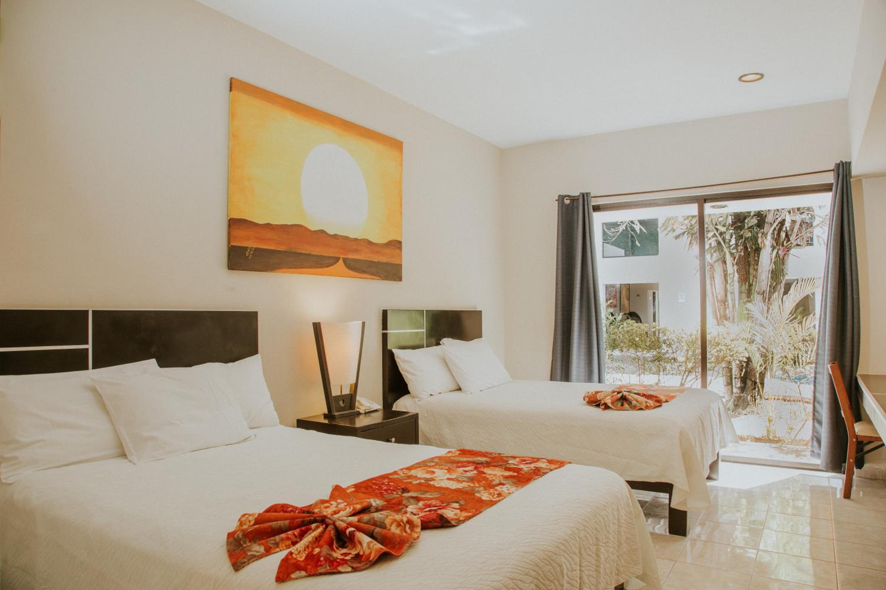 Superior with Two Double Beds and Fridge photo 1