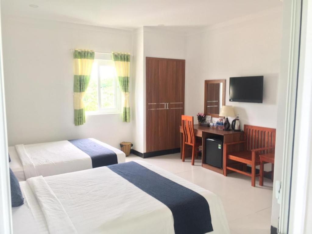 Deluxe Triple Room - Photo 8