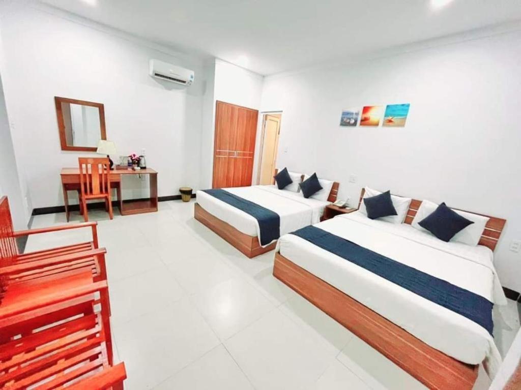 Deluxe Triple Room - Photo 7
