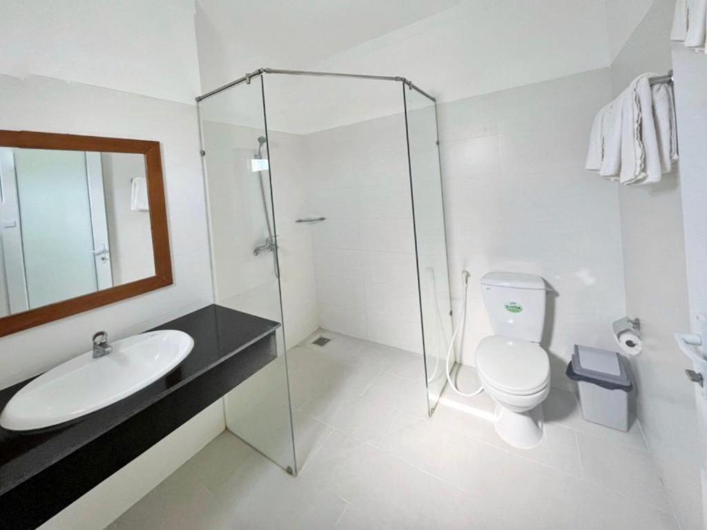 Deluxe Triple Room - Photo 11