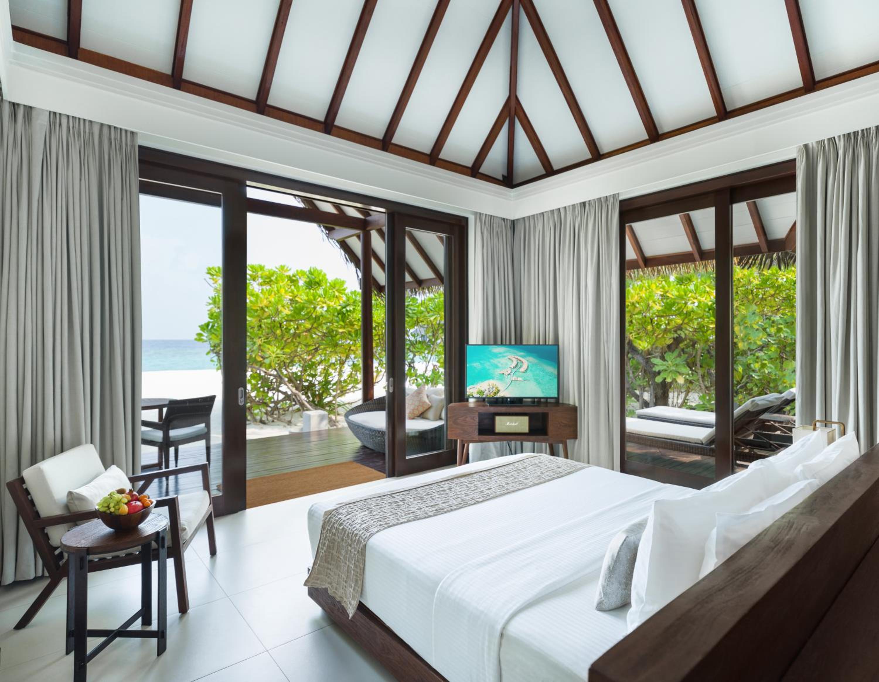 Beach Villa – Personalized Butler Service | Private Sea Plane Lounge Access | Kids Club With Optional Nanny Services | Maldivian Traditional Village Experience | Access To 5 Exceptional Dine-Around Outlets