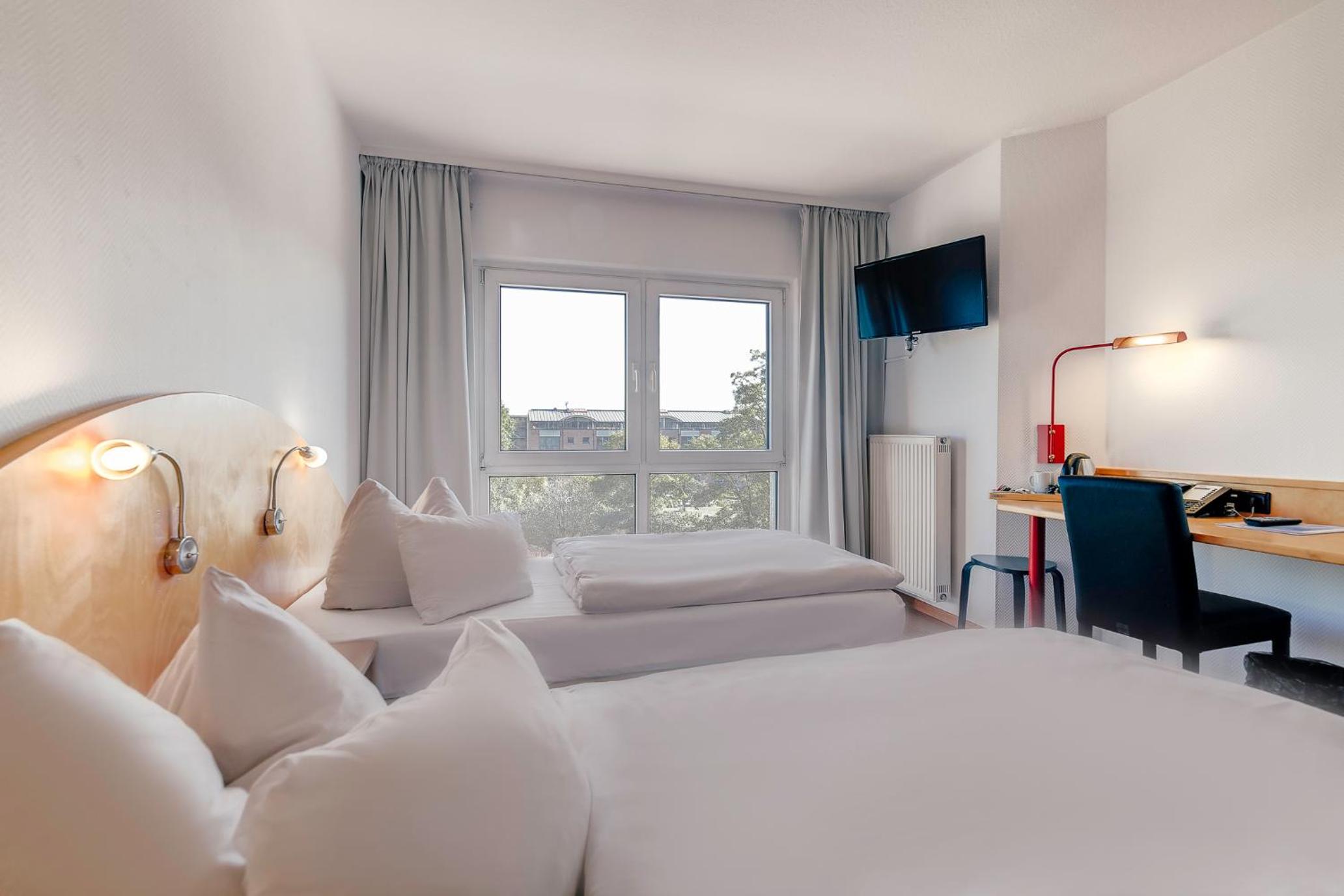 Standard Twin Room - Photo 17
