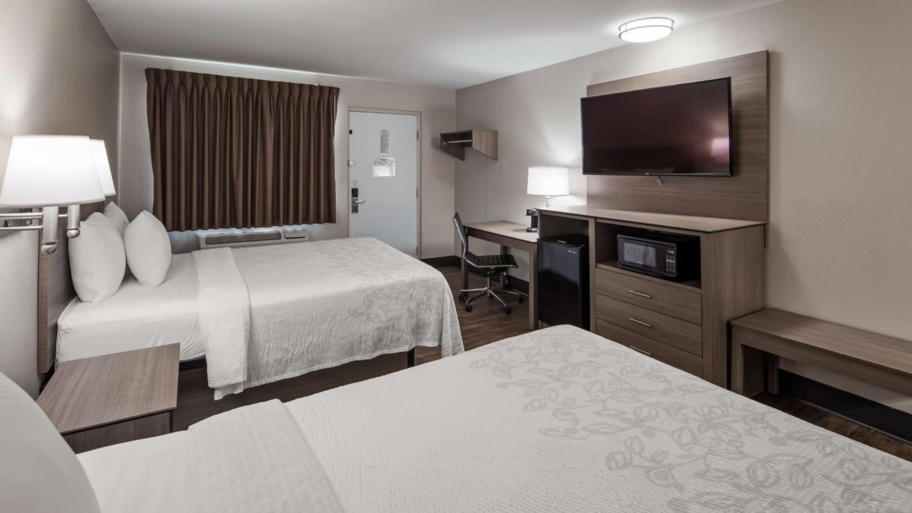 Queen Room with Two Queen Beds - Photo 1