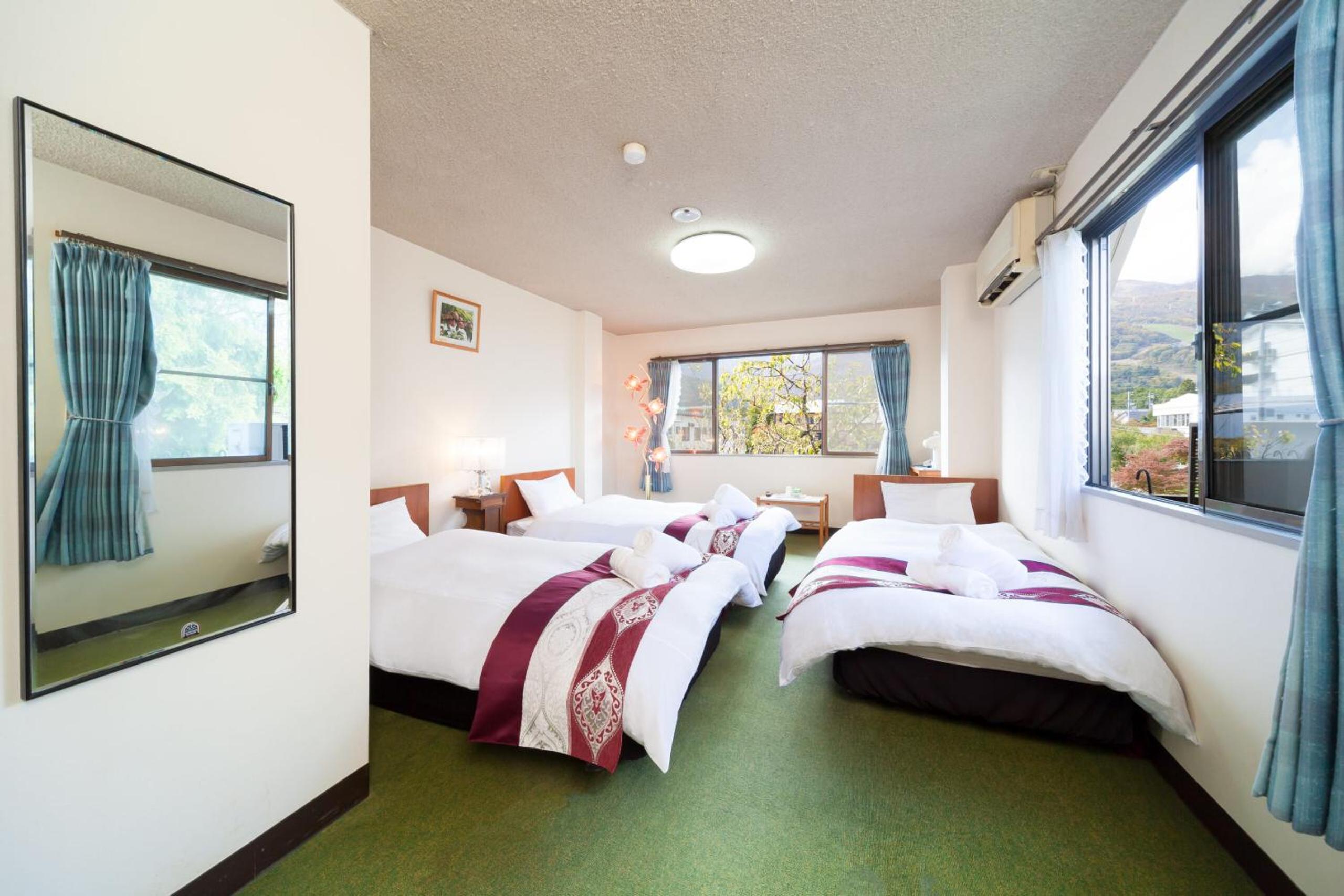 Quadruple Room with Private Bathroom