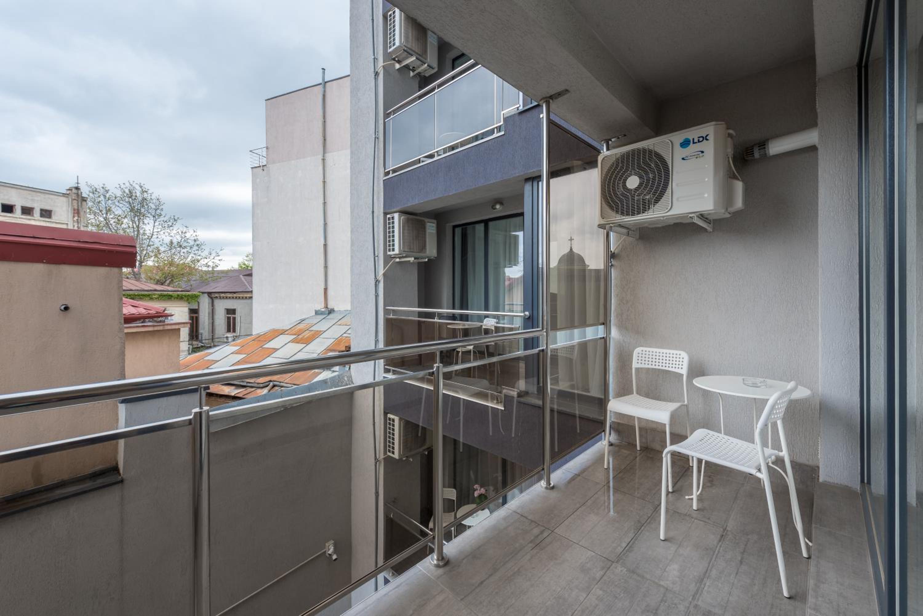 Apartment with Balcony - Photo 2