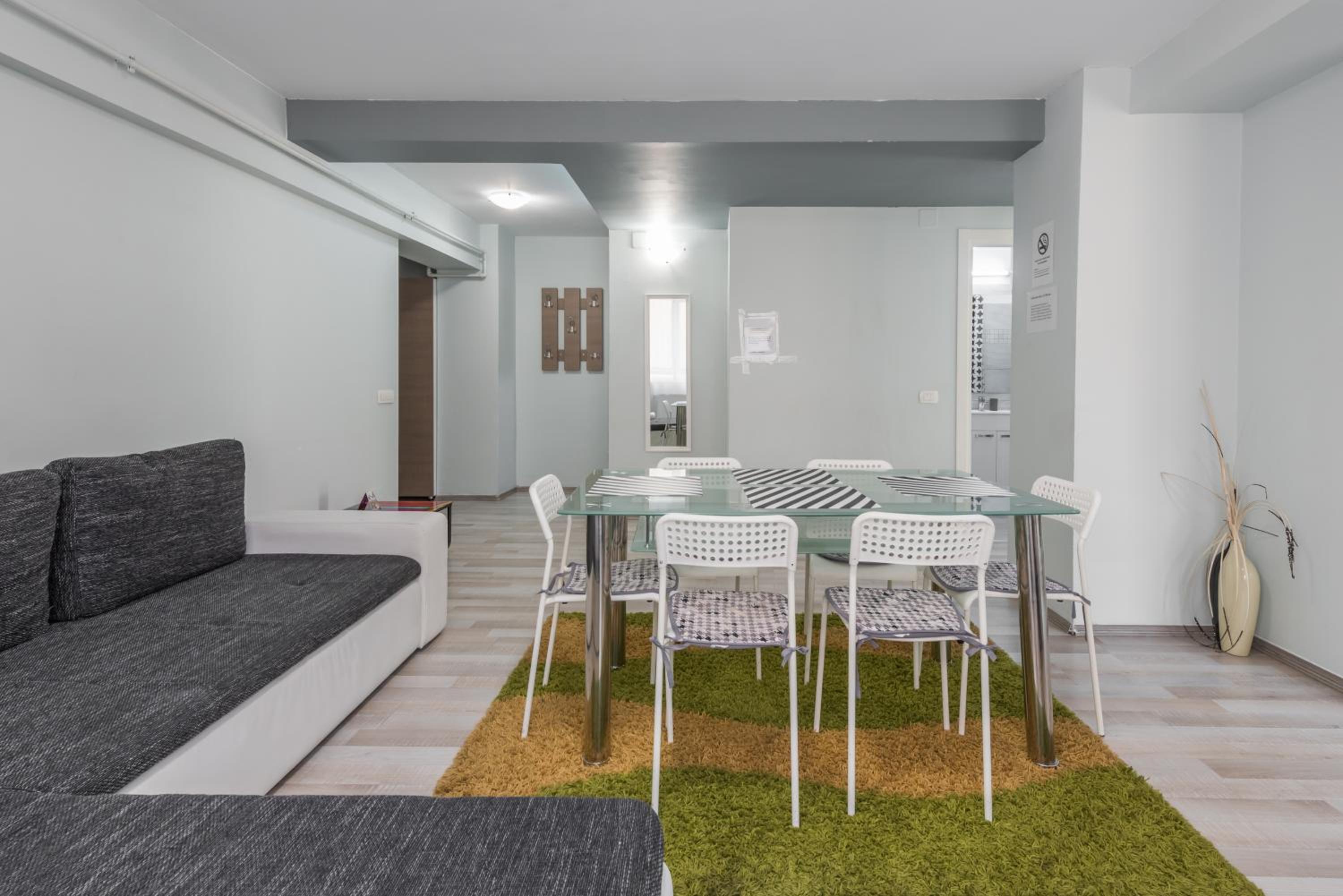 Three-Bedroom Apartment with Balcony - Photo 9