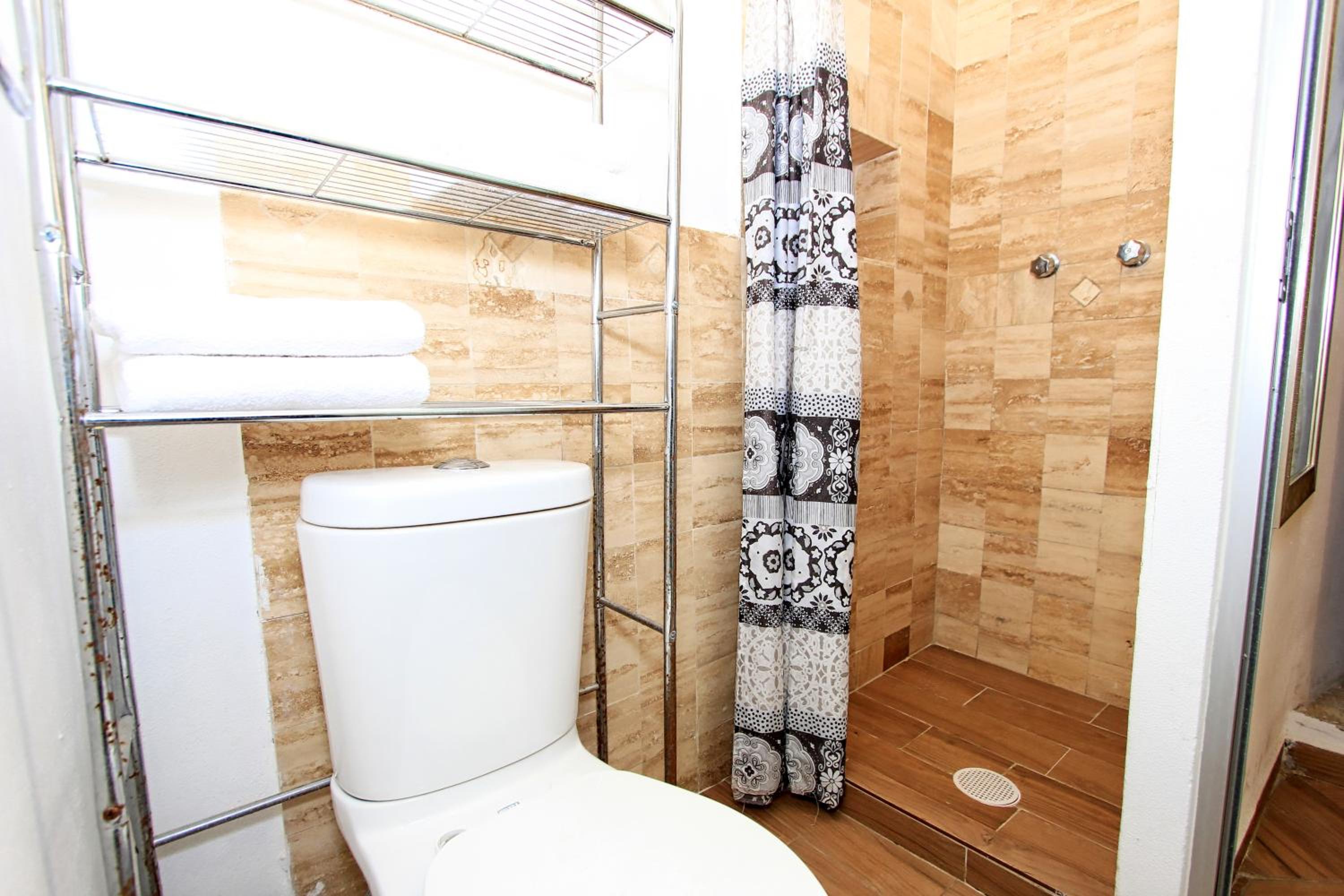 King Suite with Balcony - Photo 24