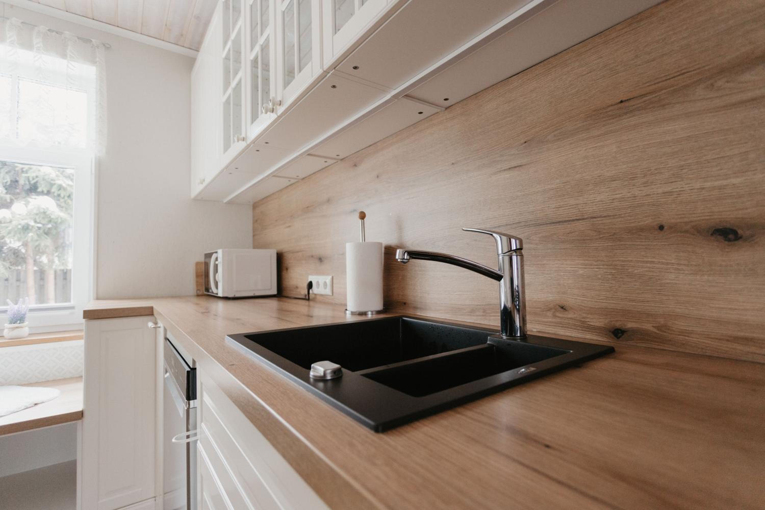 Three-Bedroom House - Photo 16