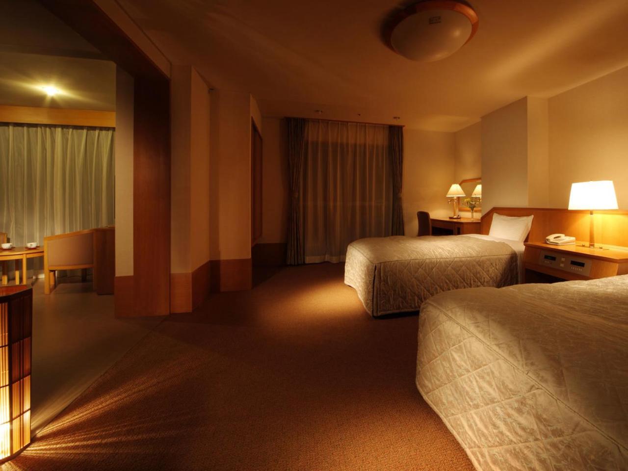 Standard Twin Room - Photo 1
