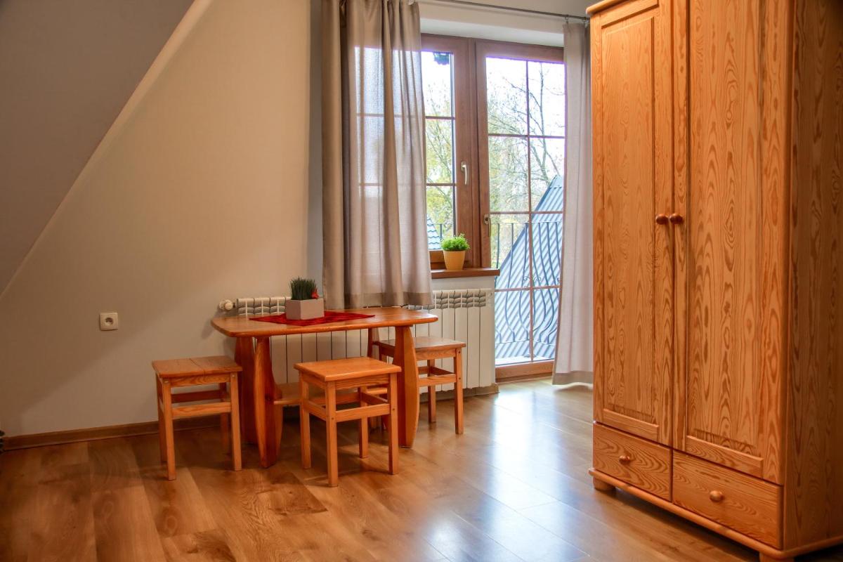 Family Room with Balcony - Photo 4
