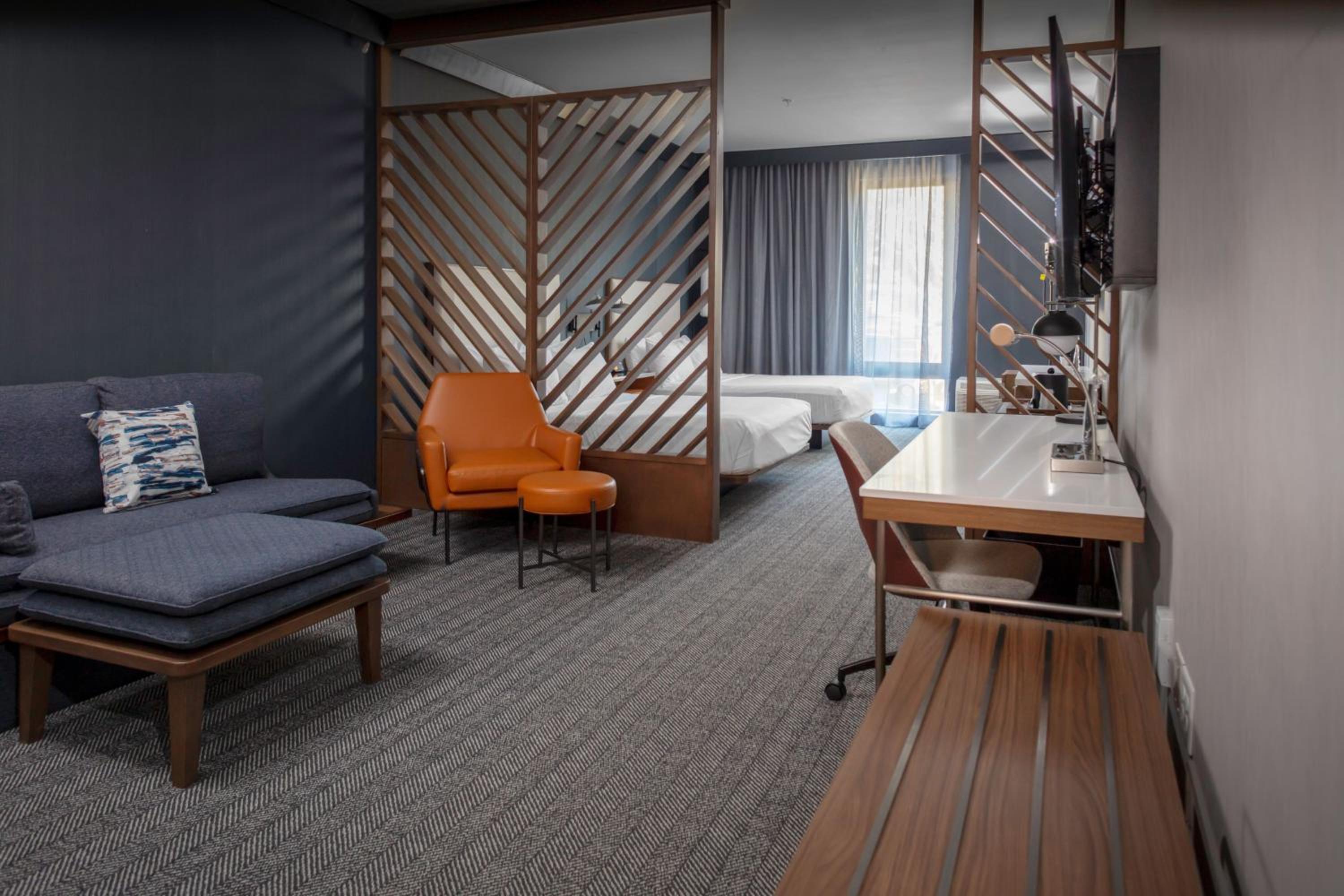 Queen Suite with Two Queen Beds and Sofa Bed - Photo 4