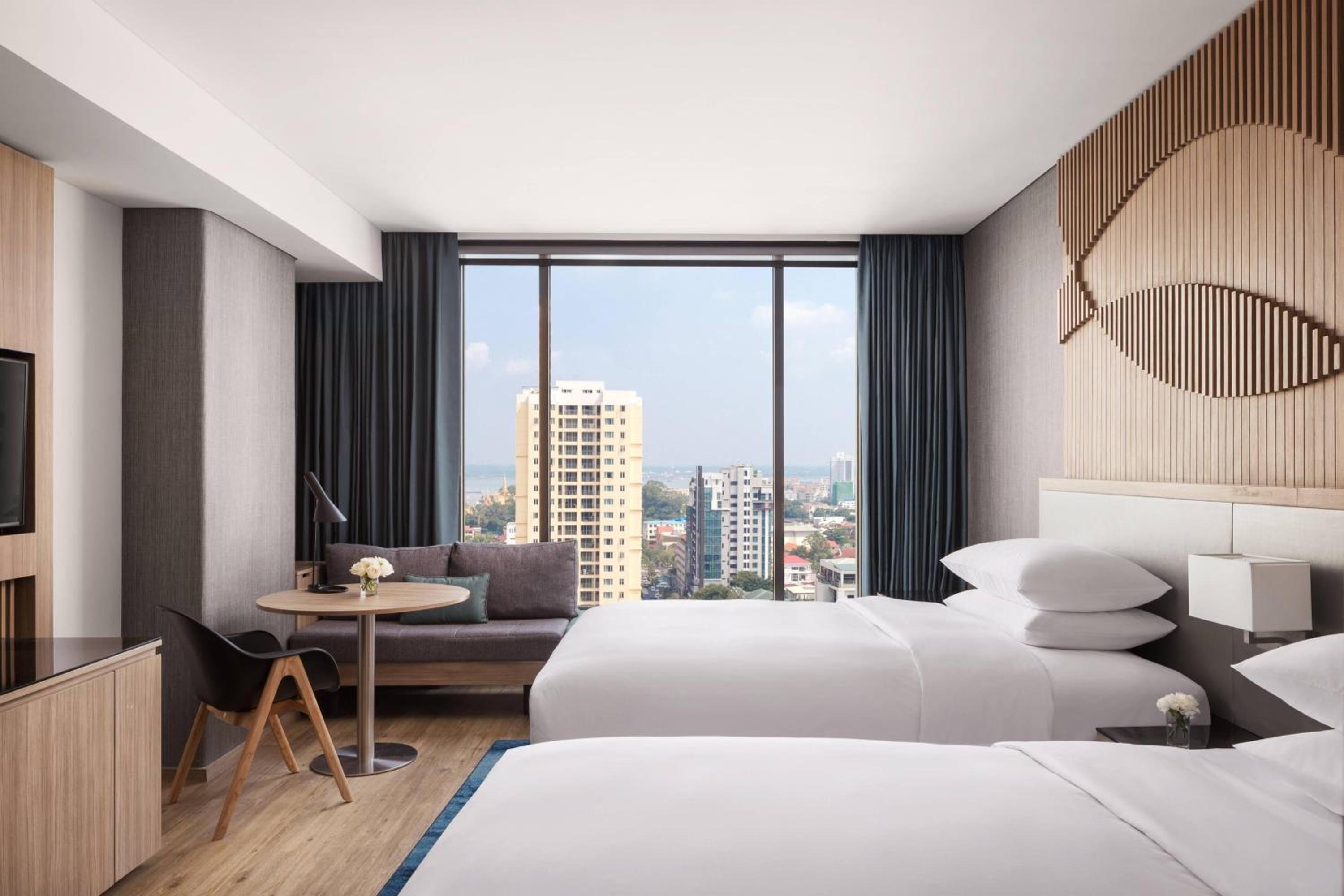 Deluxe Twin Room with Sofa bed - Photo 3