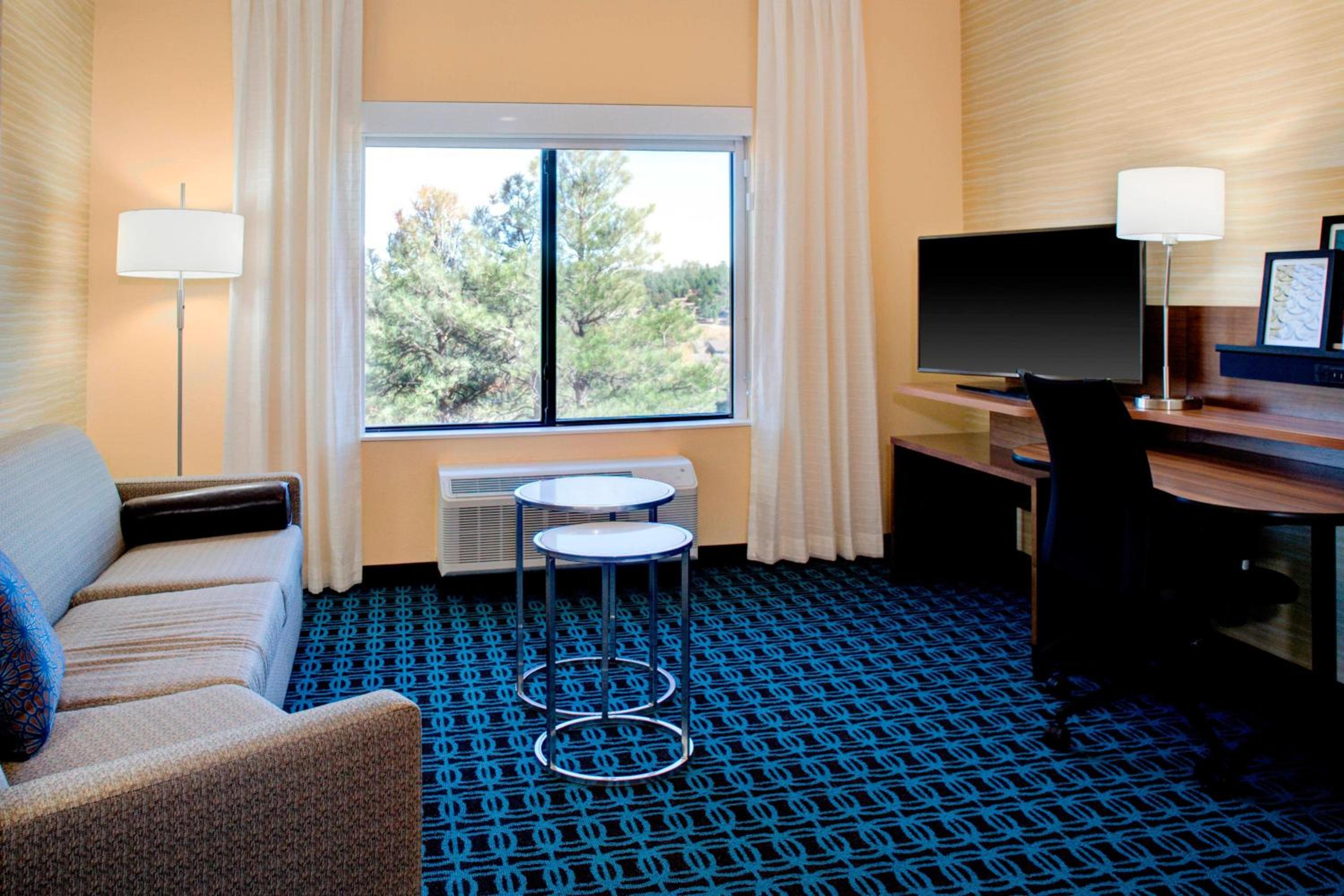 Queen Suite with Two Queen Beds and Sofa Bed