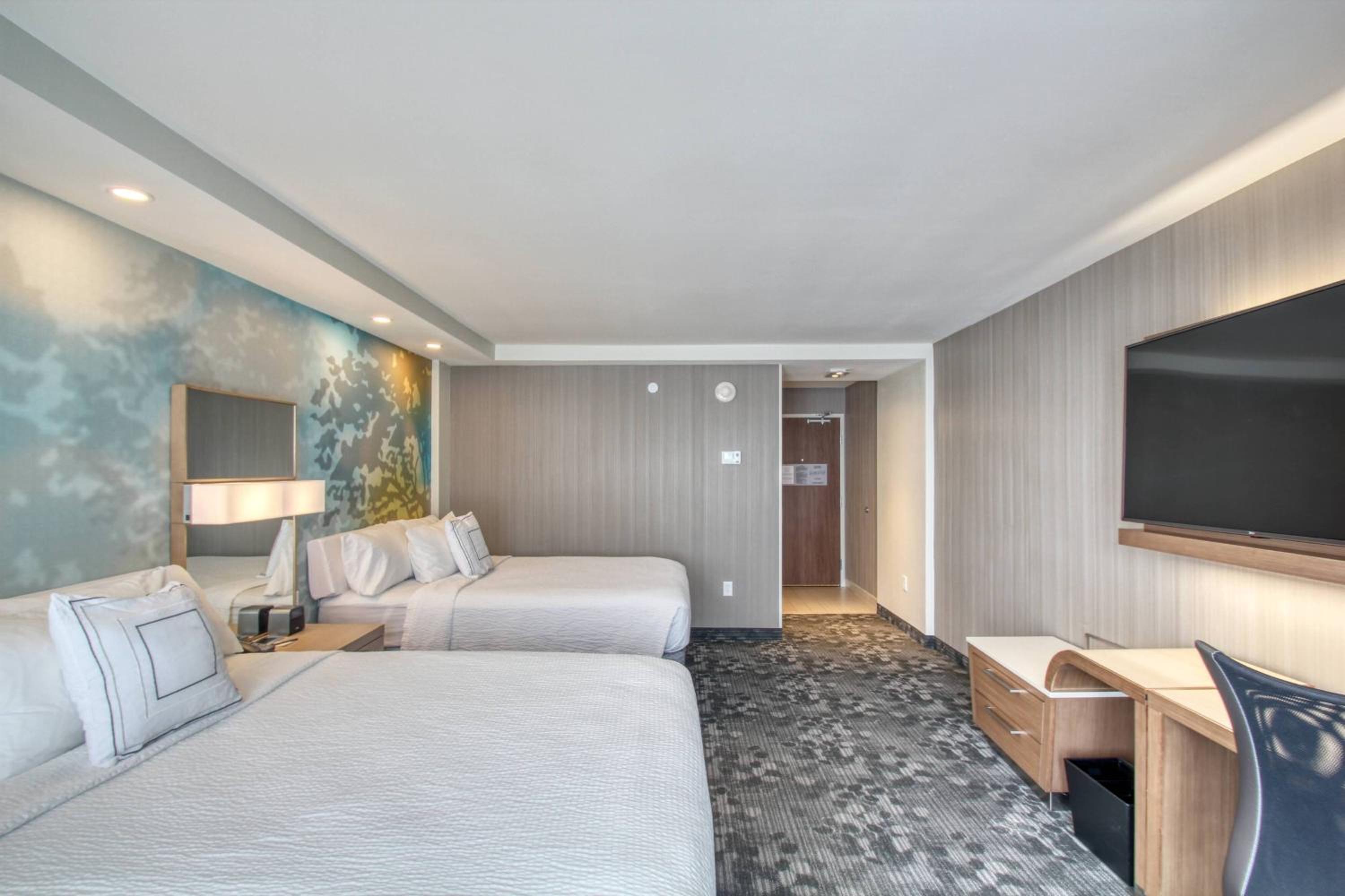 Queen Room with Two Queen Beds - Hearing Accessible photo 1