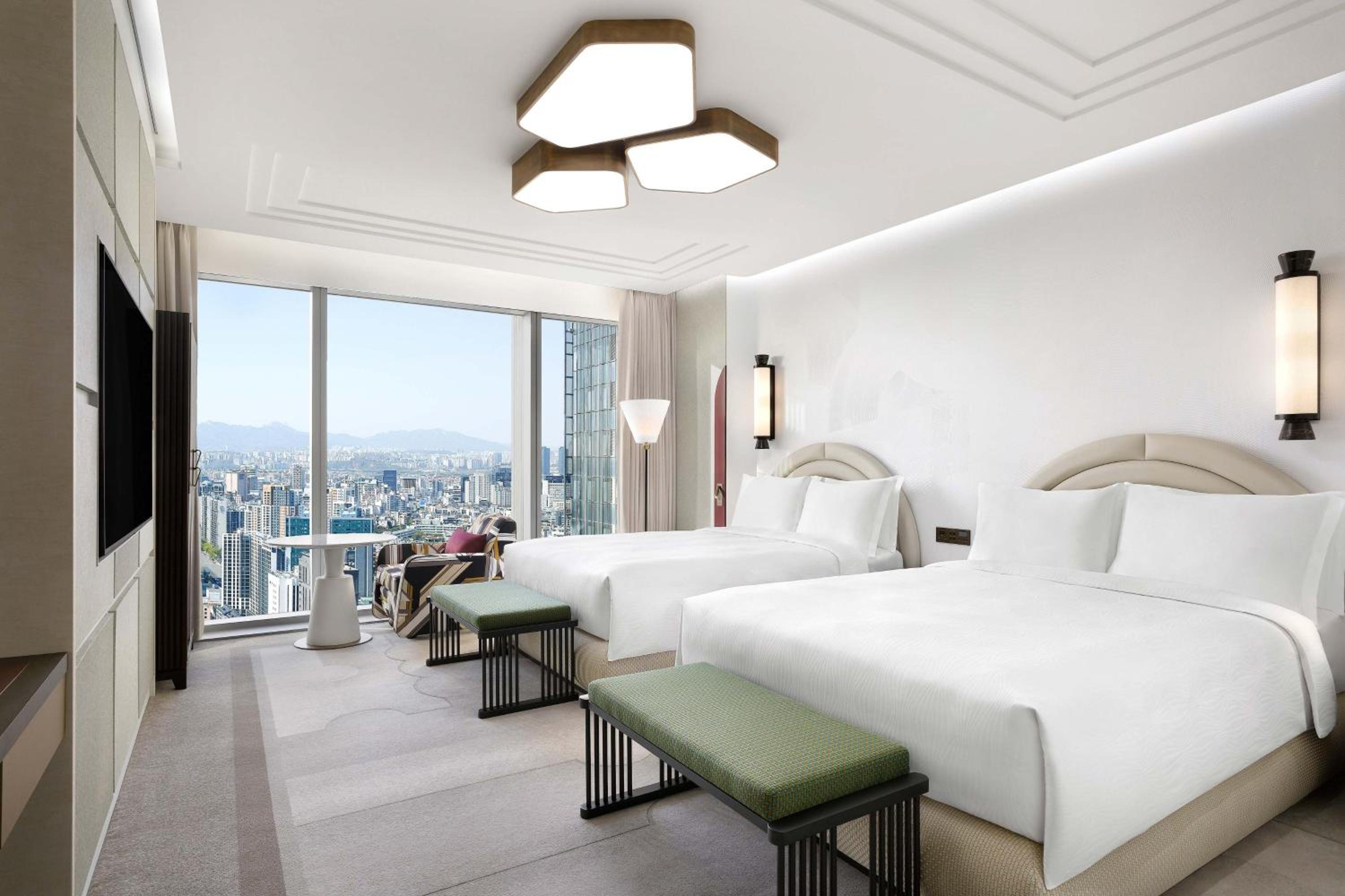 Masters Queen Room with Two Queen Beds and City View - Photo 1