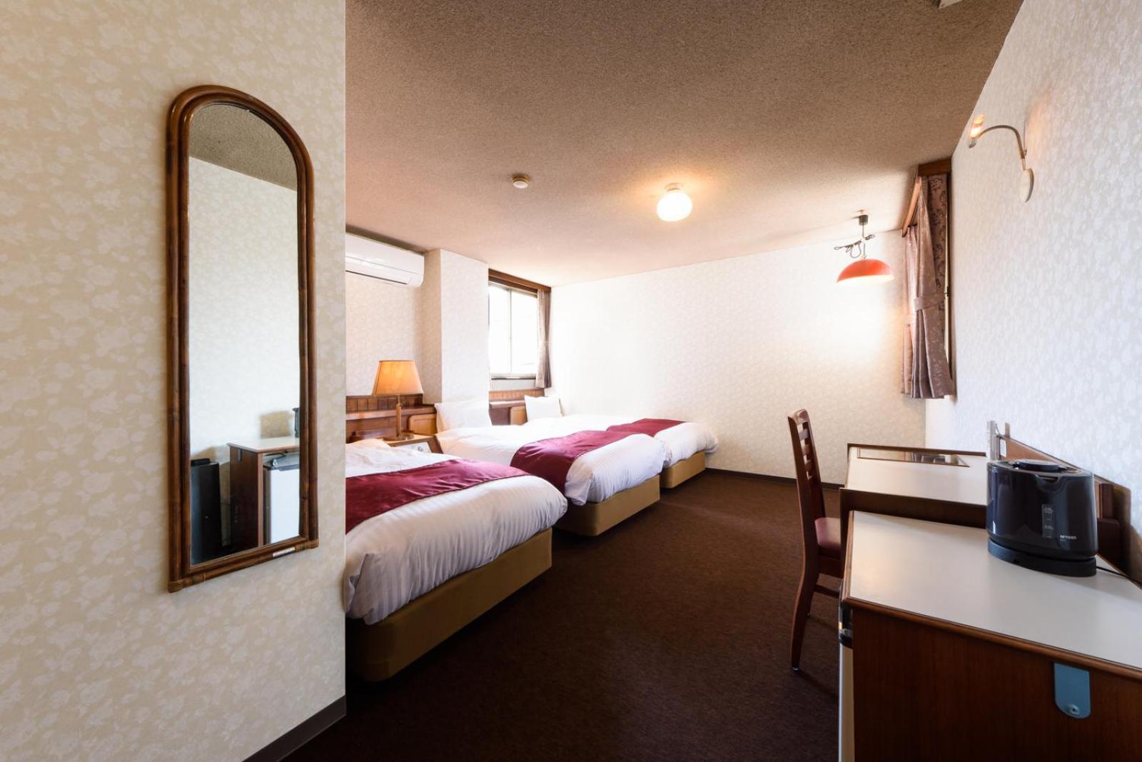 Triple Room - Photo 1