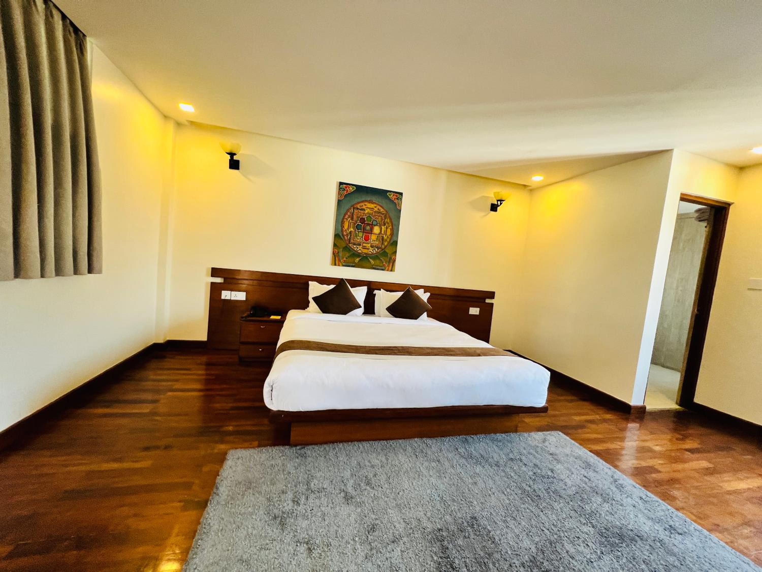 Deluxe King Room - Photo 4