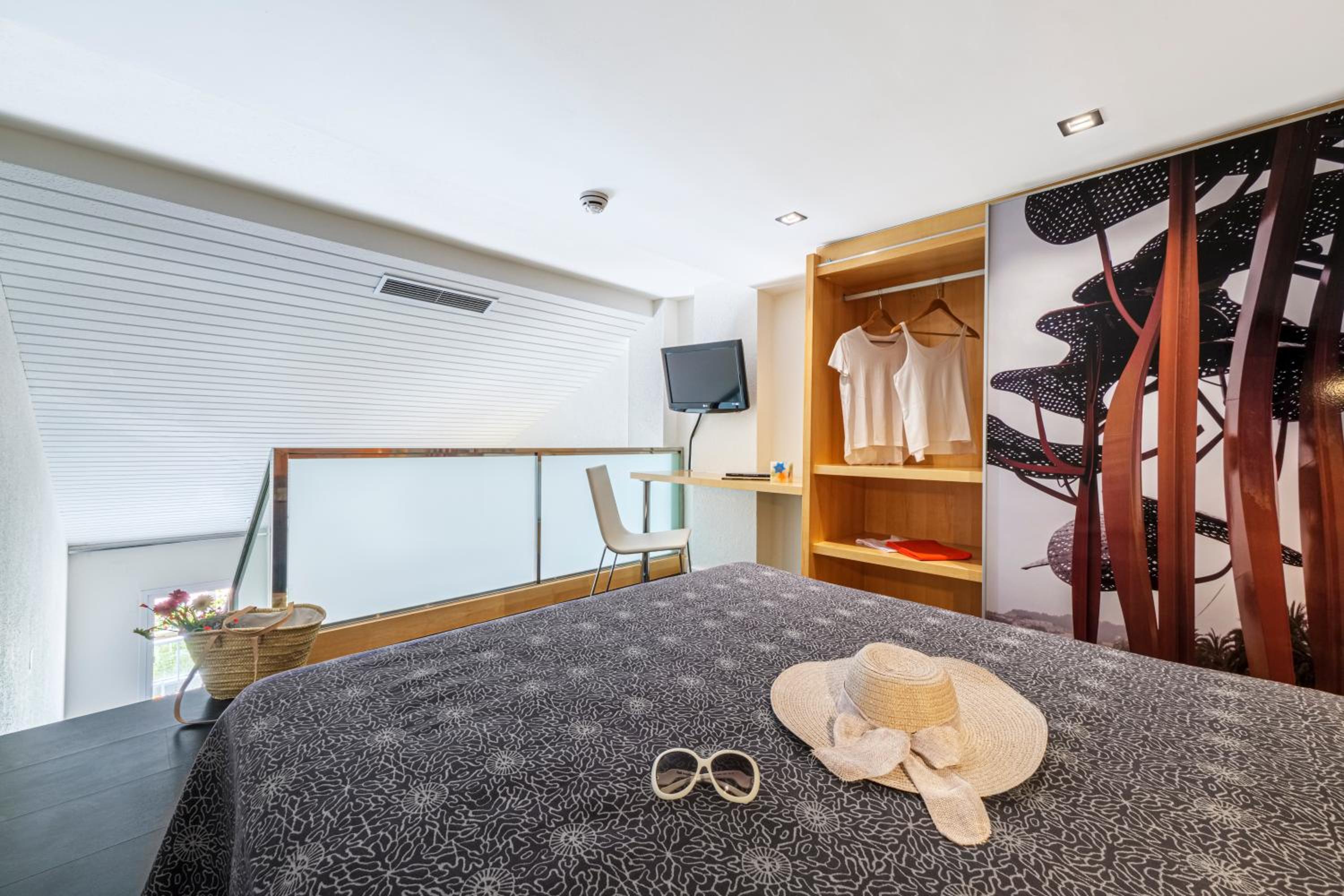 Habitación Dúplex (2 Adultos + 1 Niño)